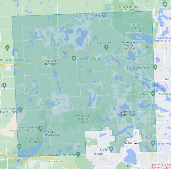 Map showing areas around Walled Lake, Michigan, with labels for lakes, parks, and suburbs.