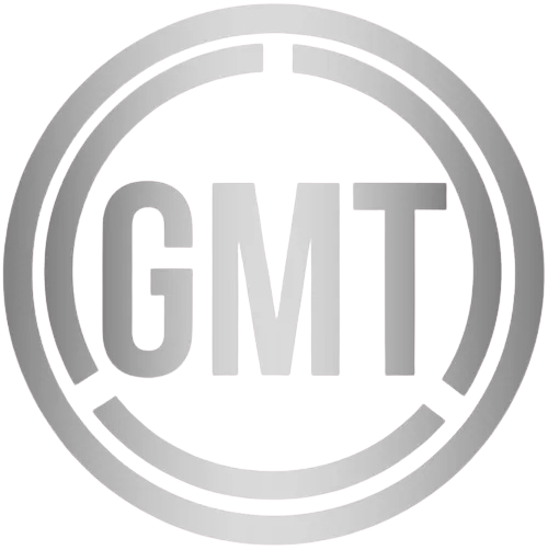 Black and gray logo with the letters 'GMT' encircled by two concentric rings.