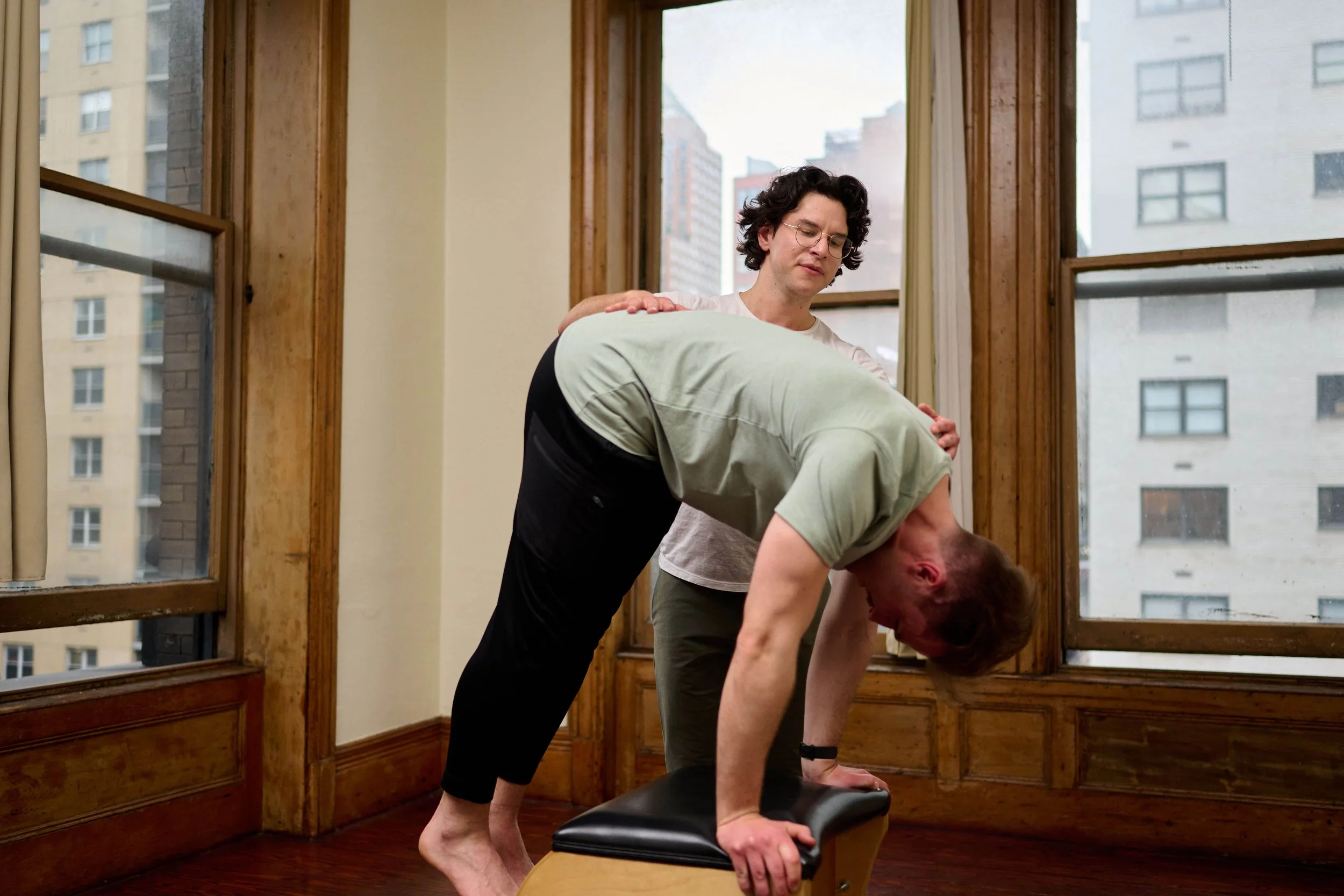 Cam working one on one with student on Wunda Chair