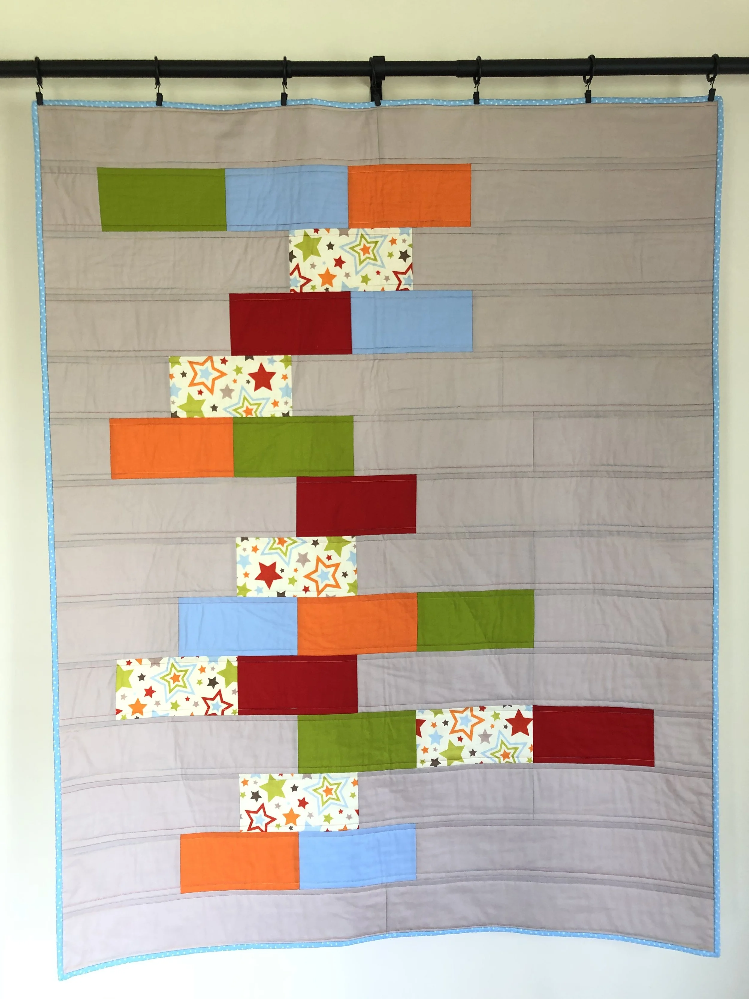 Modern star graphic bricks quilt.jpeg
