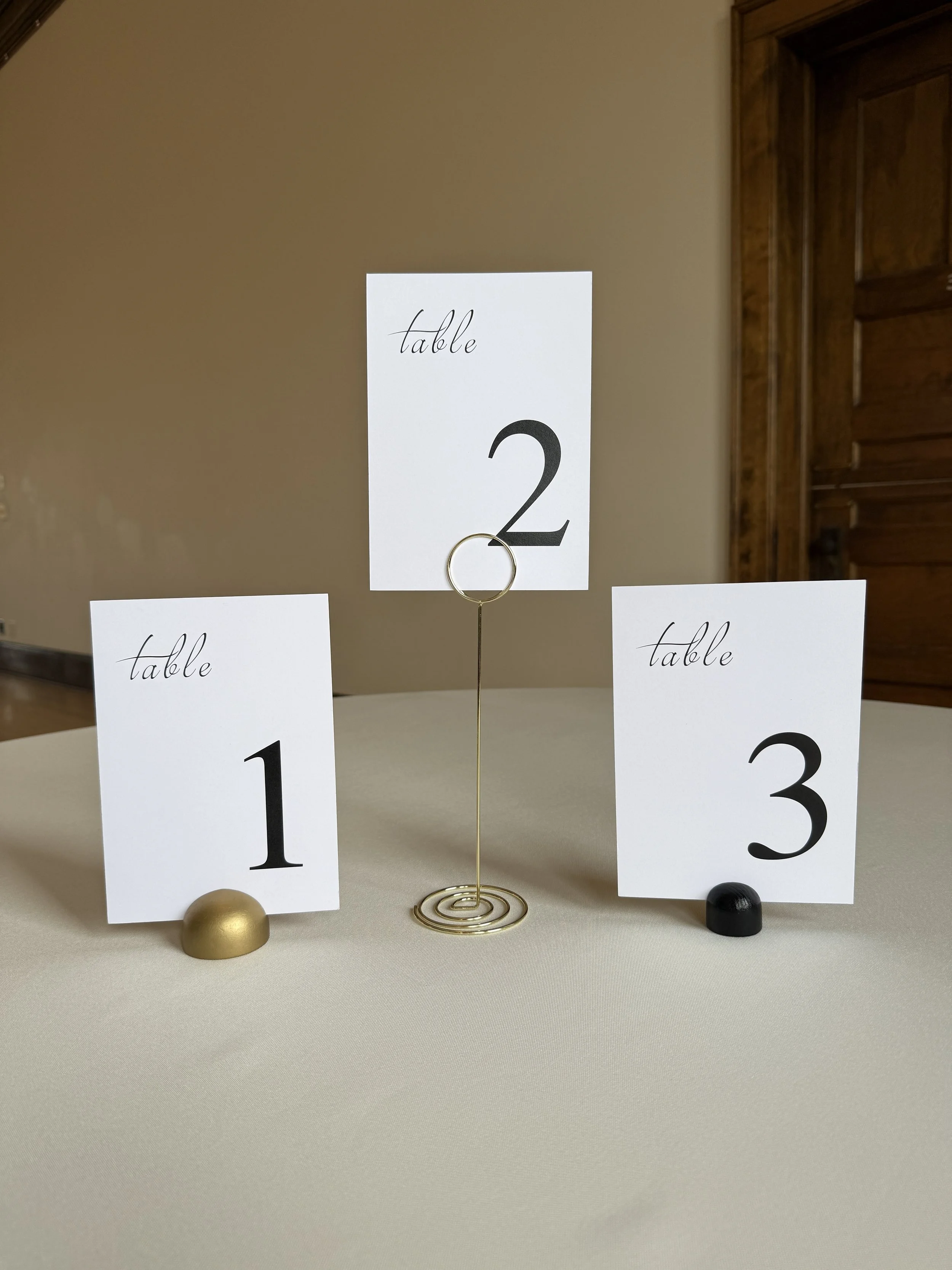 Table Number Holders
1. Gold Dome - 20 Available
2. Gold Wire - 28 Available  
3. Black Dome - 30 Available
