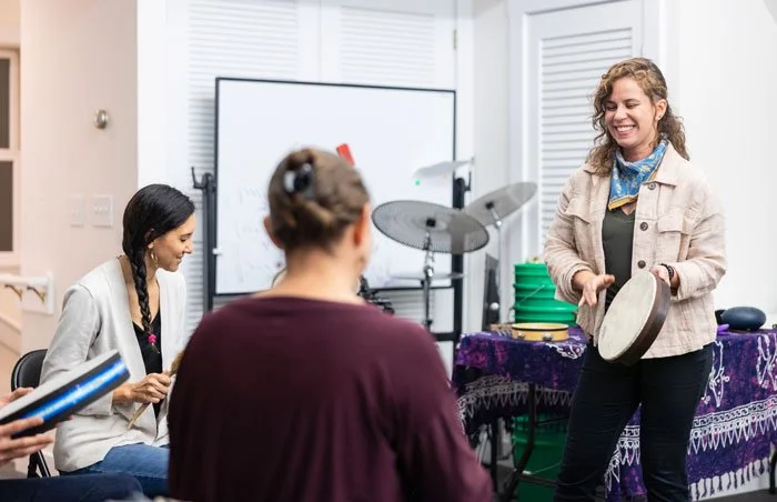 Group music therapy, Marcie leading a group