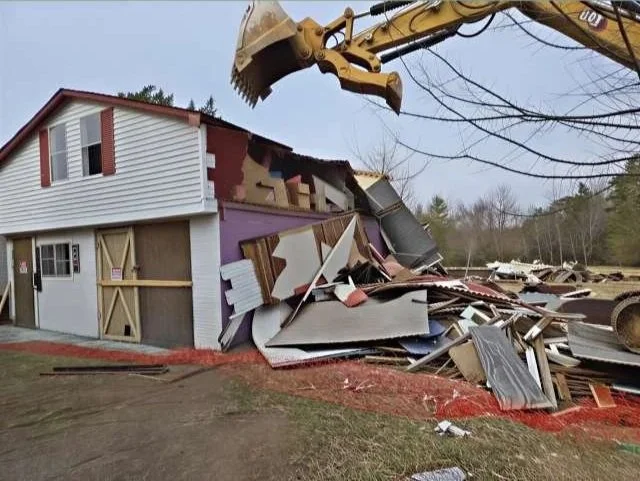 Demolishing a two story building