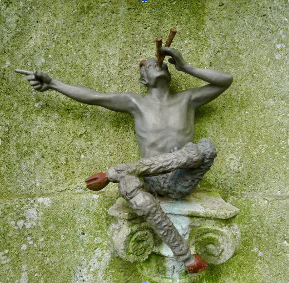 A photograph of the god Pan playing the flute