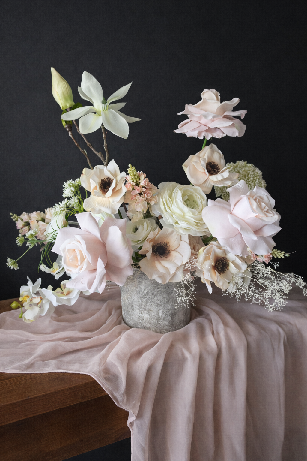 Contemporary wedding centrepiece design in blush and white by Wild Willow Event Design, Wedding Florist in Belfast, Northern Ireland.