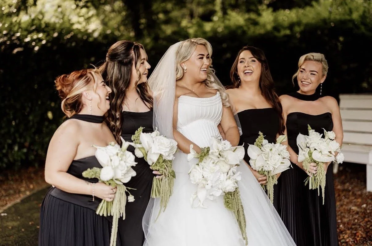 Modern editorial white and green wedding flowers held by the bridal party made by Willow Heather Flowers wedding florist NI
