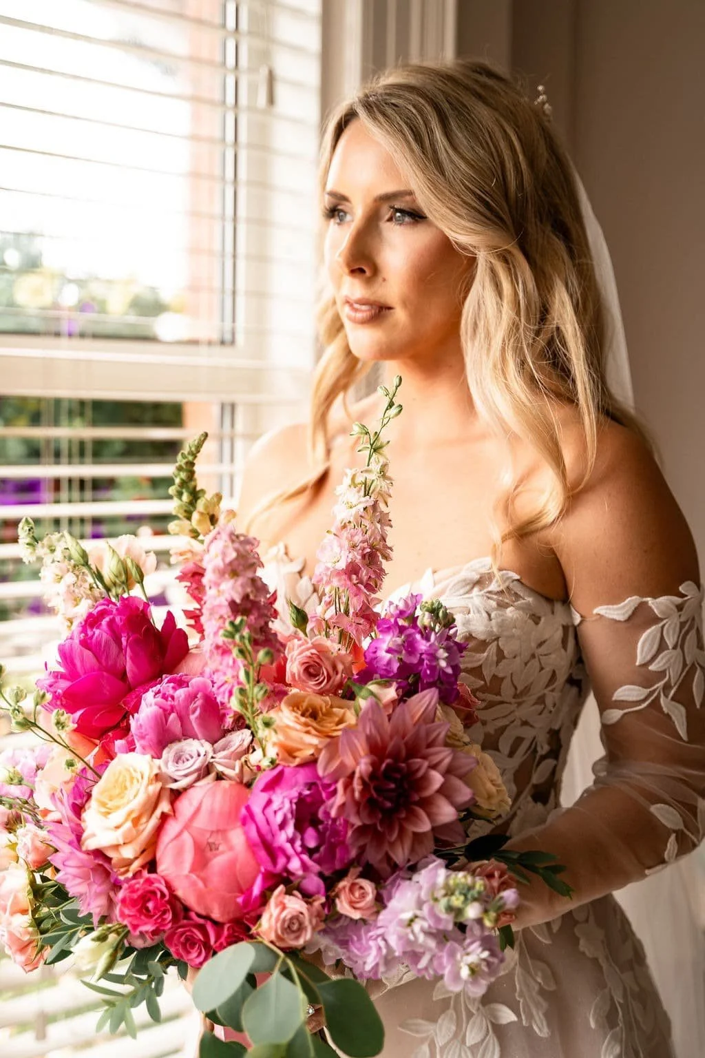 Romantic bridal portrait at Larchfield Estate in Lisburn, Northern Ireland featuring natural light and lace wedding dress.