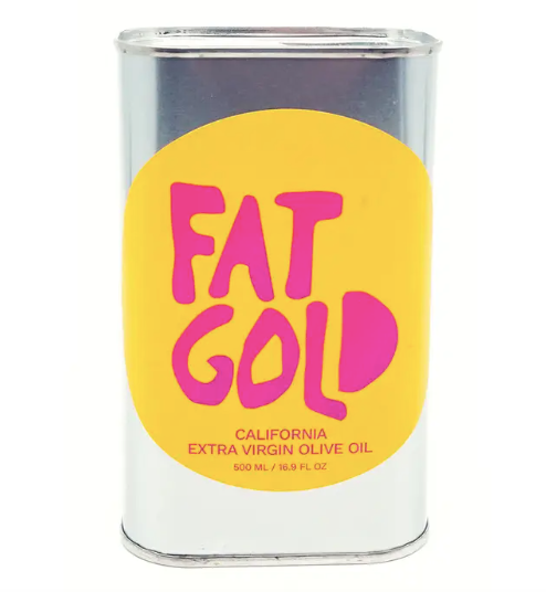 A can of Fat Gold California extra virgin olive oil with a yellow label and pink text.