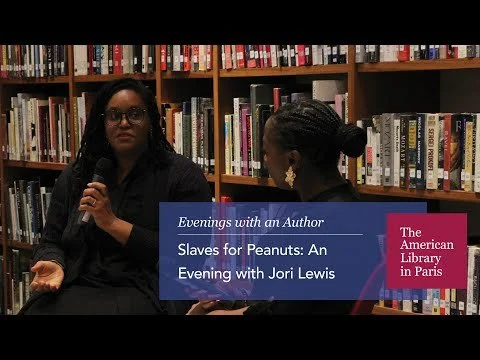 Robin Allison Davis and Jori Lewis: Two women sitting at the American Library in Paris . One woman is speaking into a microphone, and the other is listening. A blue and pink overlay displays text about an event with author Jori Lewis.