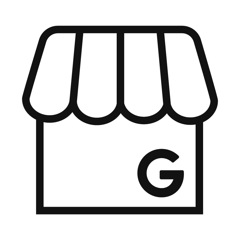Icono en blanco y negro de una tienda con un toldo y una letra G en la parte inferior derecha.