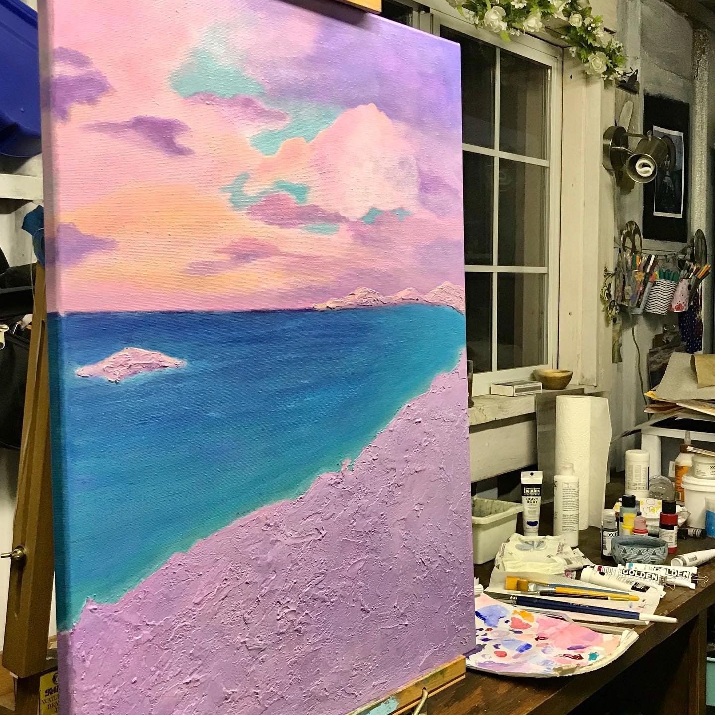 I put some more paint on this one😉 (don't mind the messy studio 🙄) #wip #workinprogress #studioscenes #joyincreating #femaleartist #socalartist #cottoncandysky #acrylicpainting #sandandsea #artlovers #cloudporn #fineart #seascapes #soulhappy #amhay
