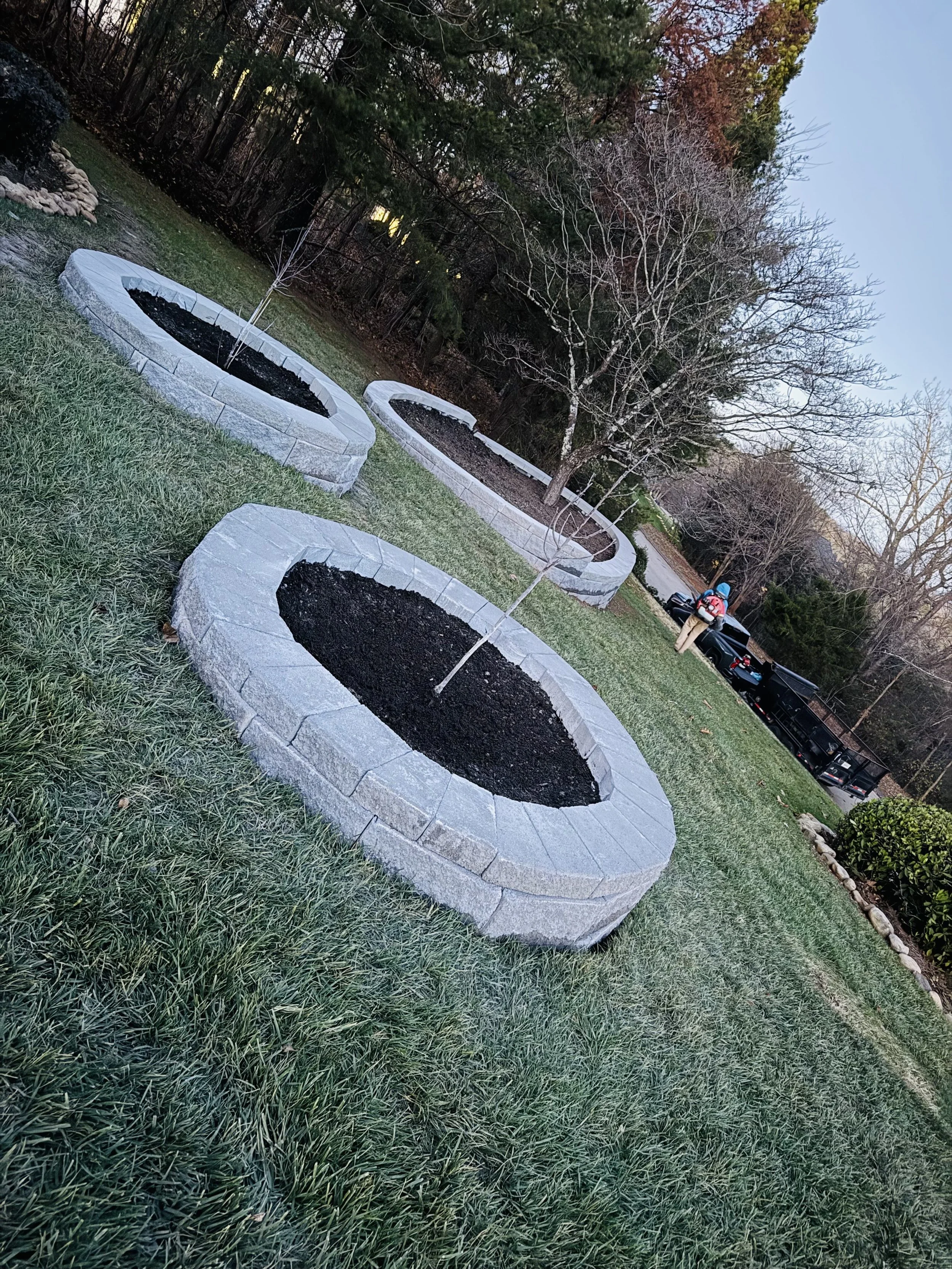 Circular raised garden beds perfect for planting, landscaping design, and visual interest.