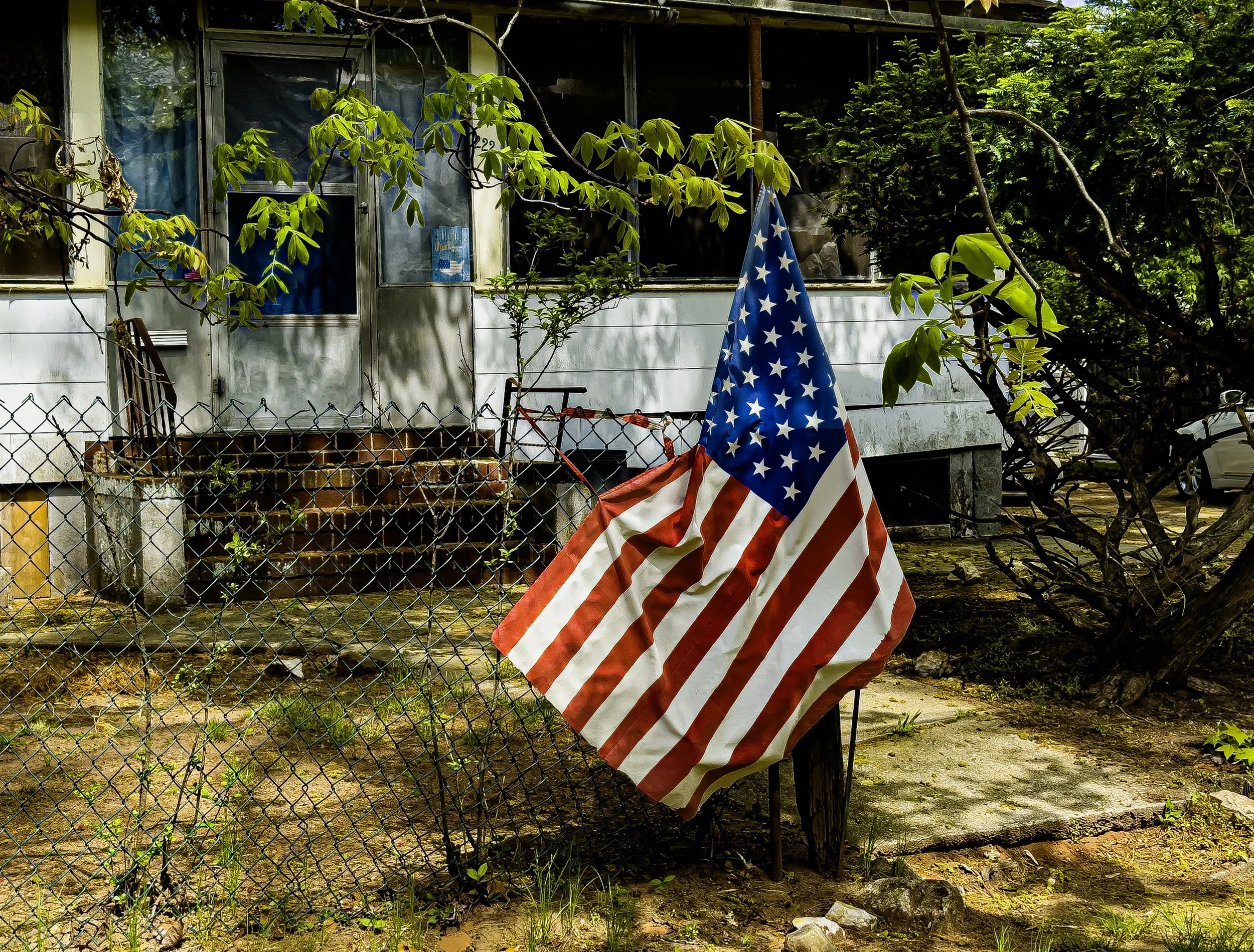 Greg_Haworth_ (Torn Flag on Fence, NJ) (1 of 1).jpg