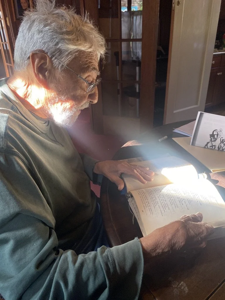 Rafael Jesus Gonzalez reading a book