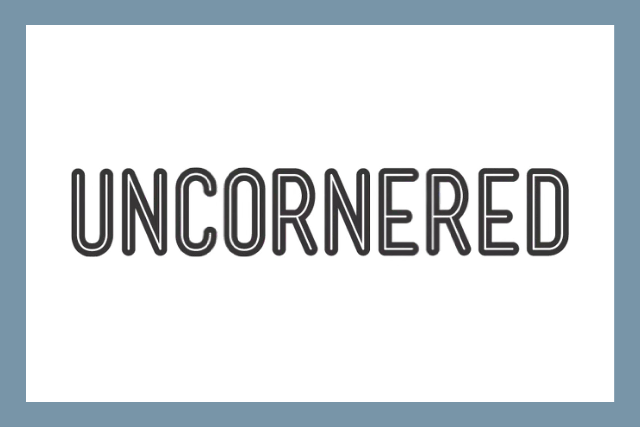 The word "UNCORNERED" in bold black letters
