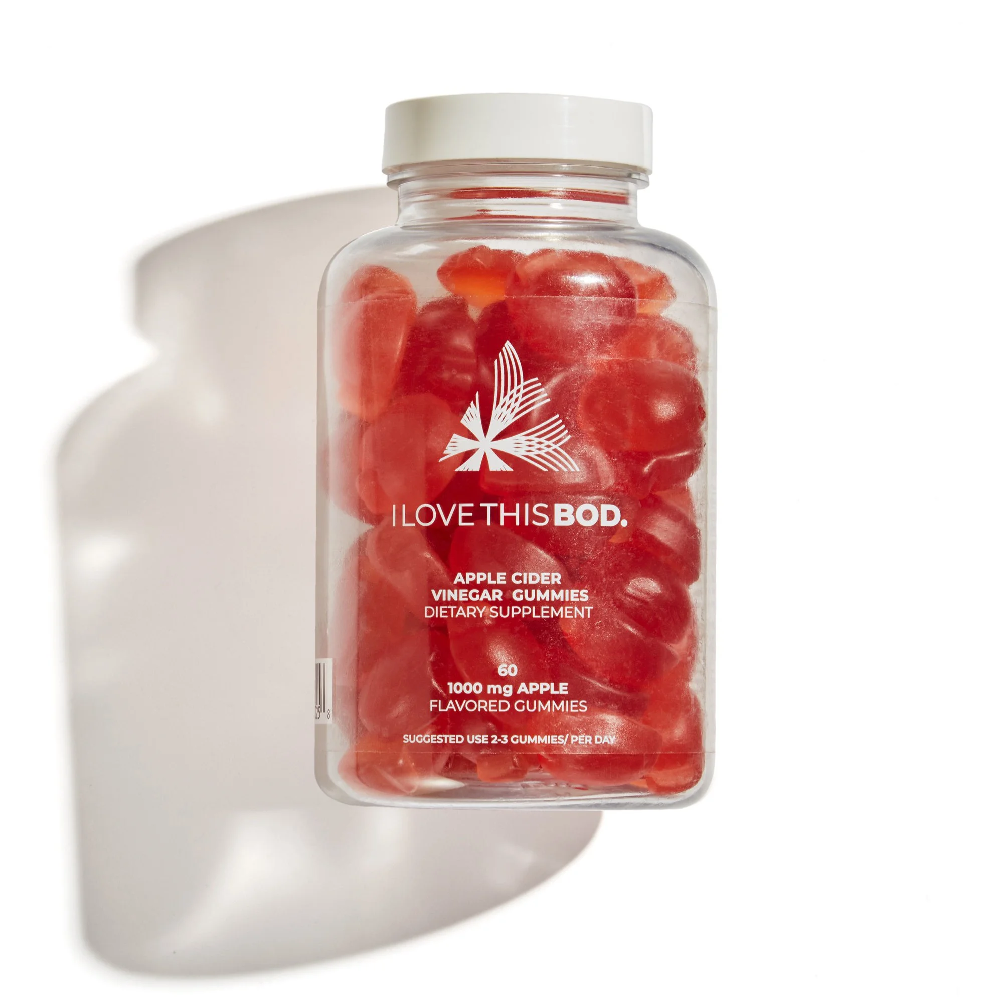 Bottle of apple cider vinegar gummies with red and orange gummy candies inside, labeled 'I Love This Bod' with a white cap, on a white background with a shadow.