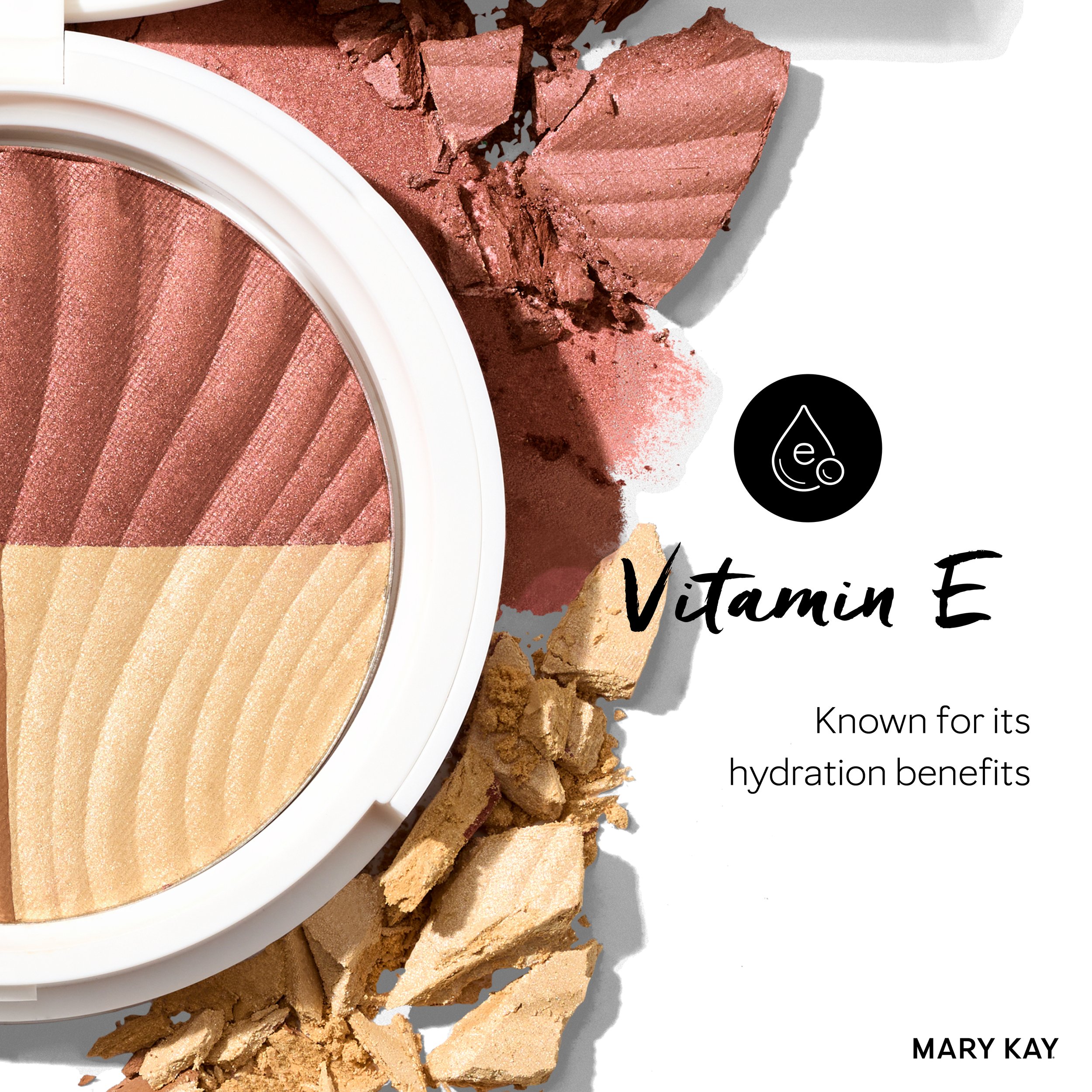 Cover of a Mary Kay booklet featuring a large makeup compact with soft peach and muted pink shades, surrounded by crushed powder and broken makeup pieces, with text highlighting Vitamin E and its hydration benefits.
