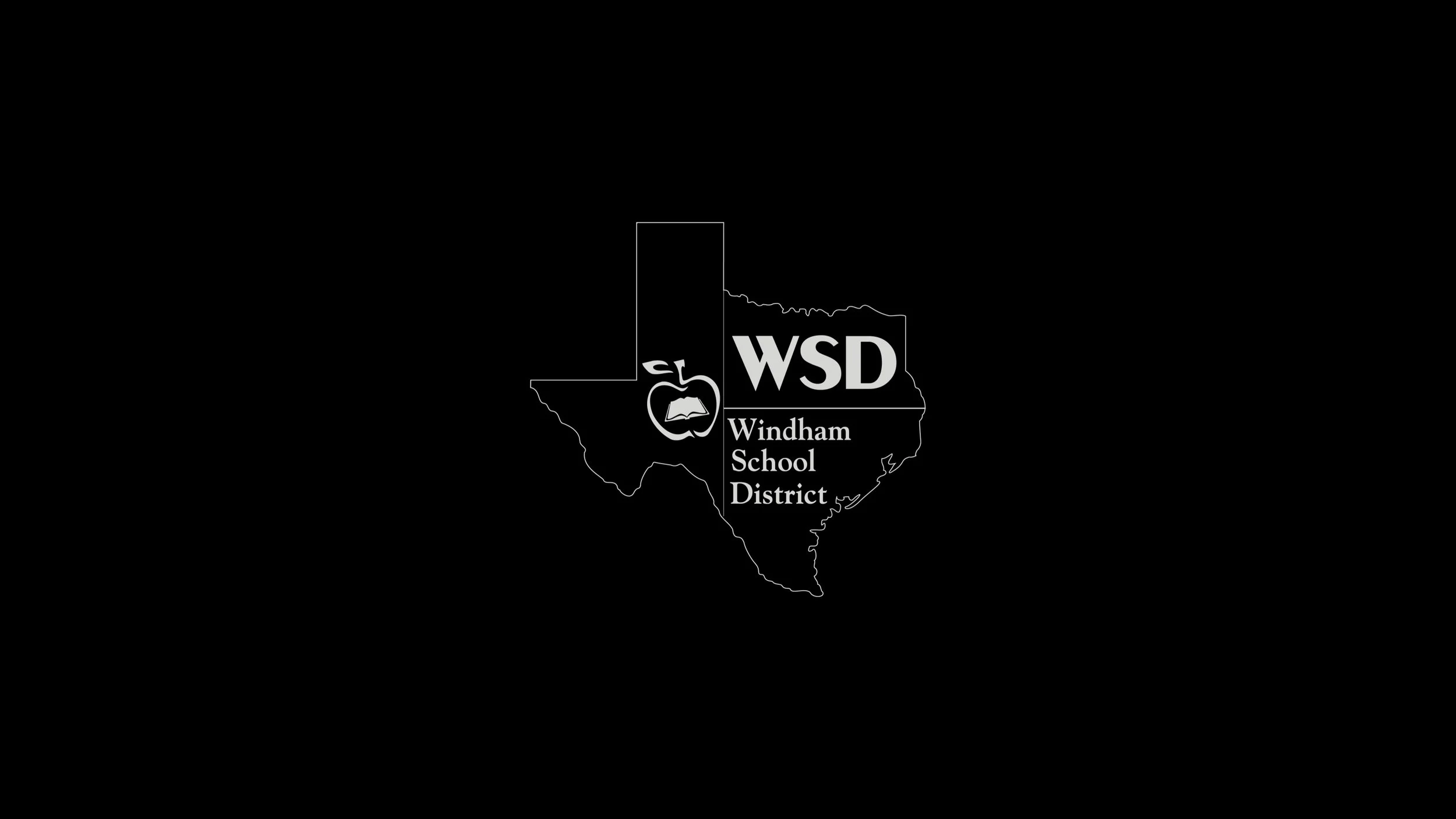 Logo of Windham School District featuring a black silhouette of Texas with the district's initials, WSD, an apple with an open book, and the text 'Windham School District'.