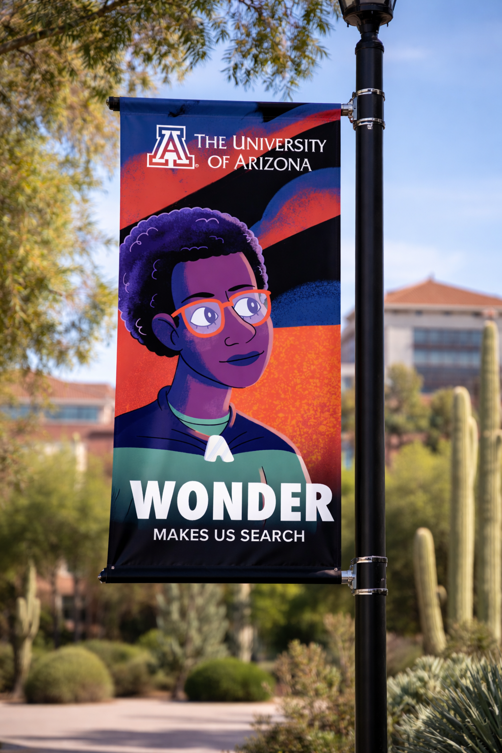 A colorful banner at the University of Arizona featuring an illustration of a woman with glasses and short curly hair, with the text "Wonder makes us search."