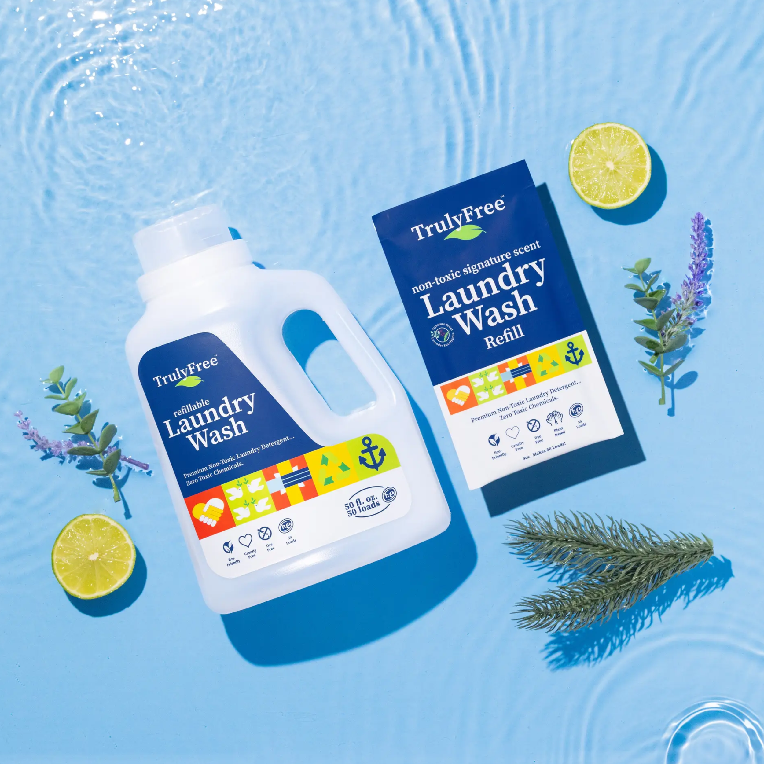 A blue two-liter bottle of TrulyFree non-toxic laundry wash on a blue background with lemon slices and lavender sprigs.