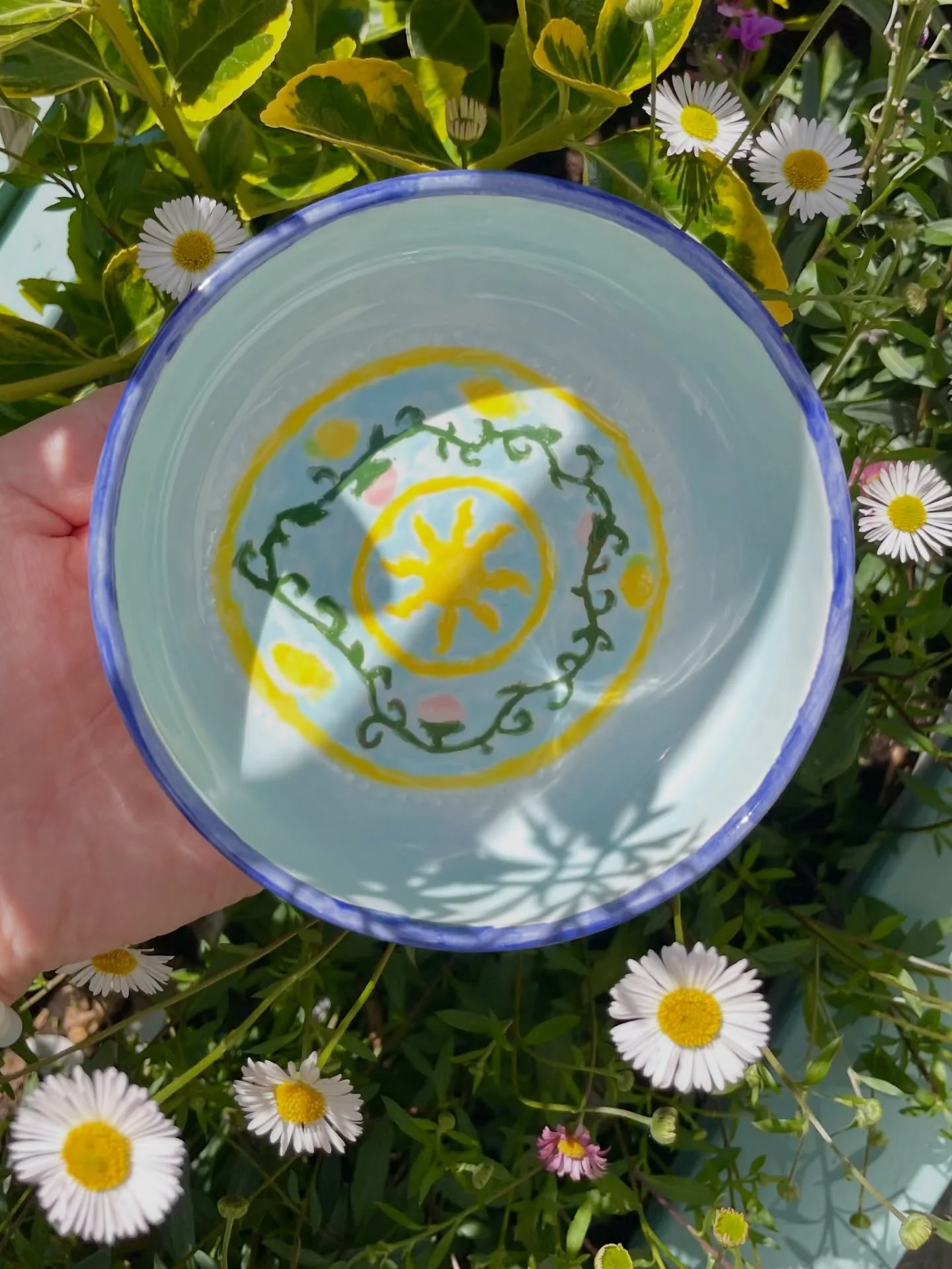 🌼 Some of your beautiful pots glowing in the sun amongst the flowers 🌸🌞