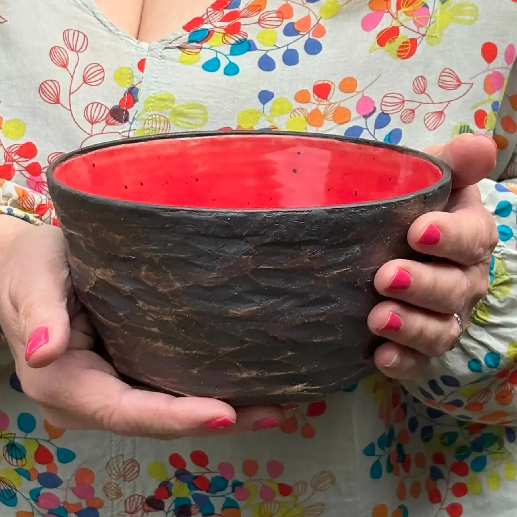 Carved Bowl with ‘sunspot’ red interior