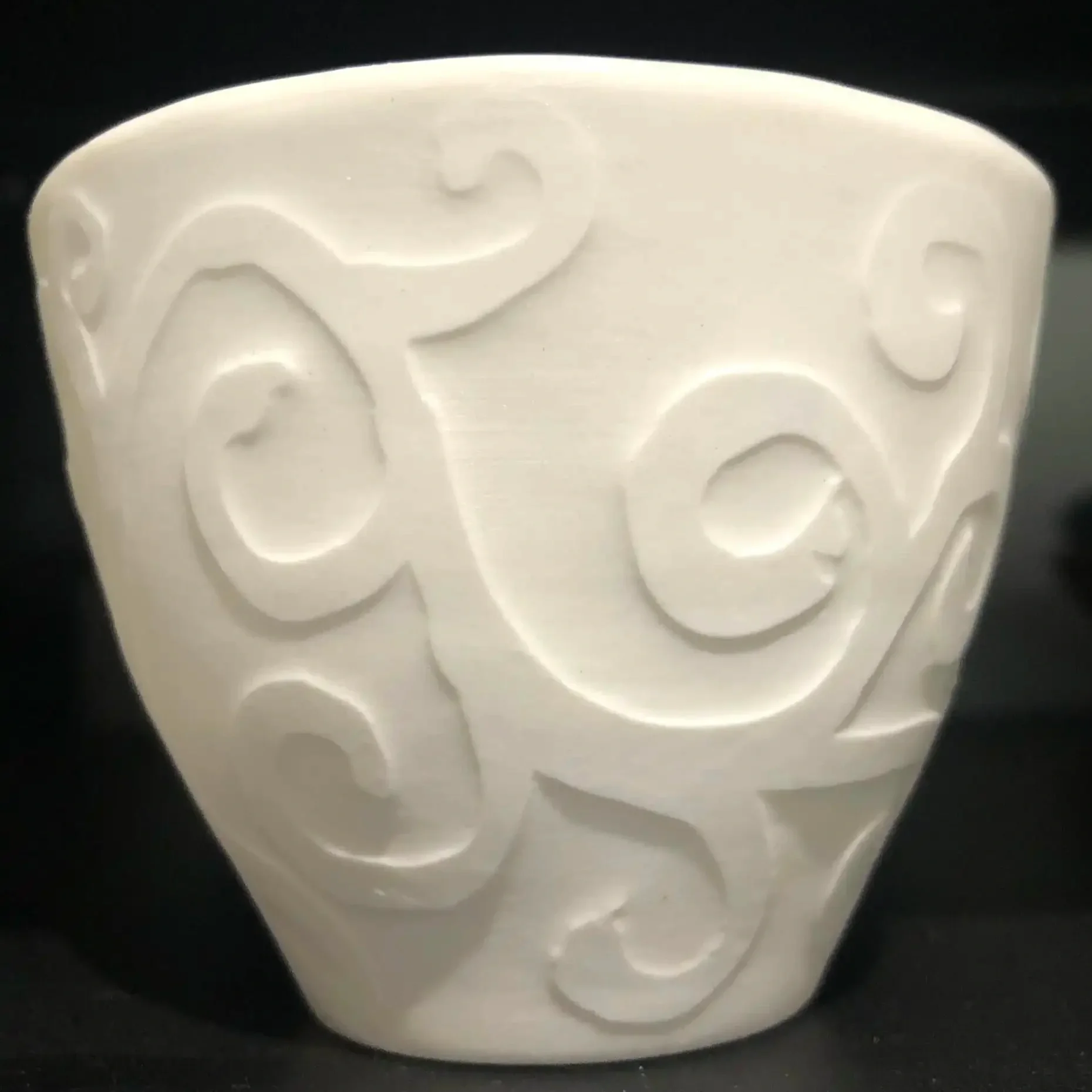 The original water etched slip-cast cup.