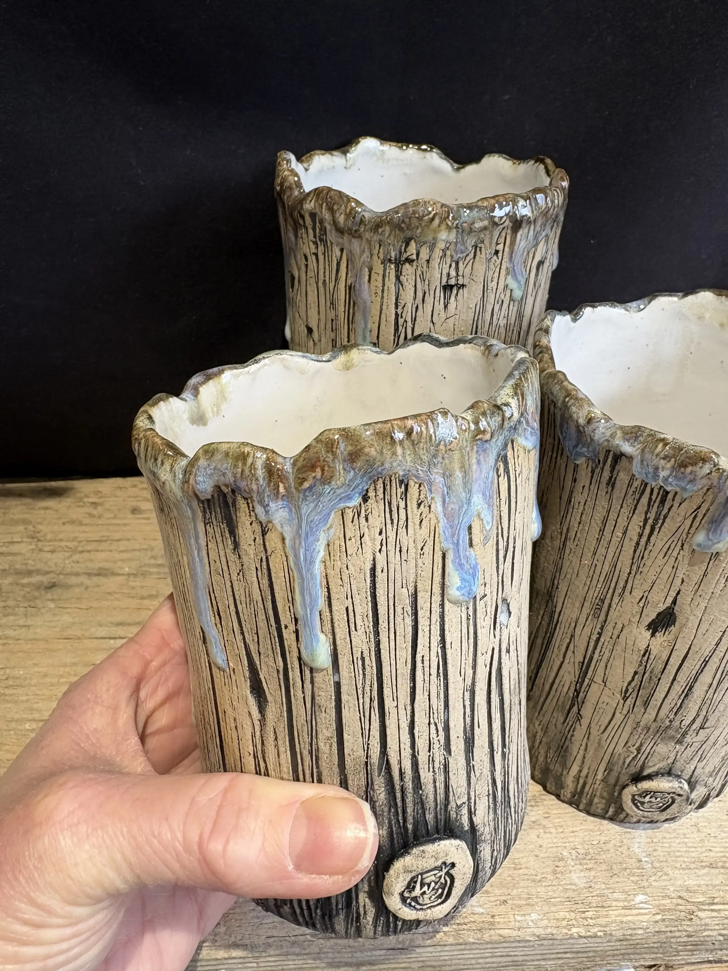 ‘Trinity’ - a group of 3 vessels in varying heights all with bark texture and 'frosted' drippy glaze forming part of the 'Winter Wonderland' collection.