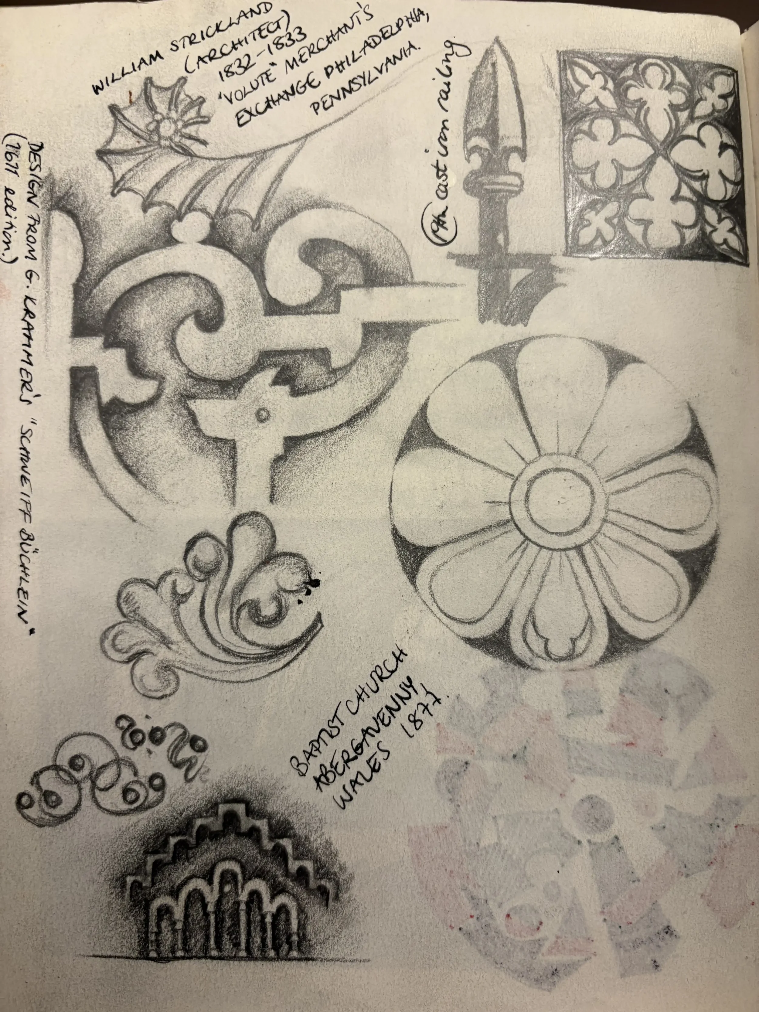 Sketches of architectural details including a decorative ironwork piece, a stained glass window, a crest or medallion, ornate woodwork.