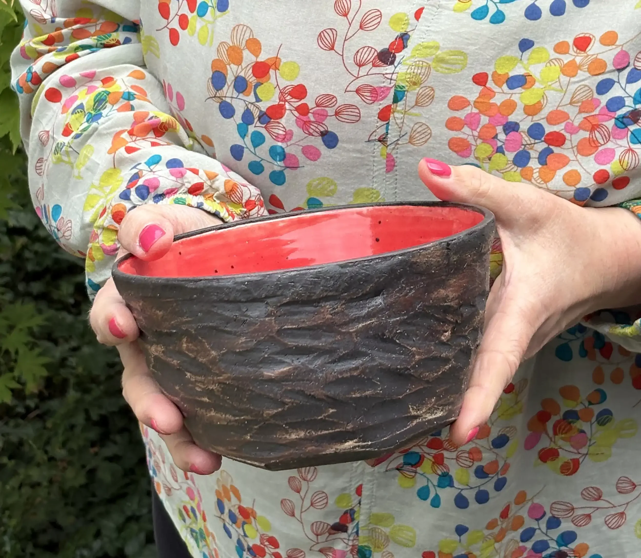 Medium thrown bowl with carved exterior.