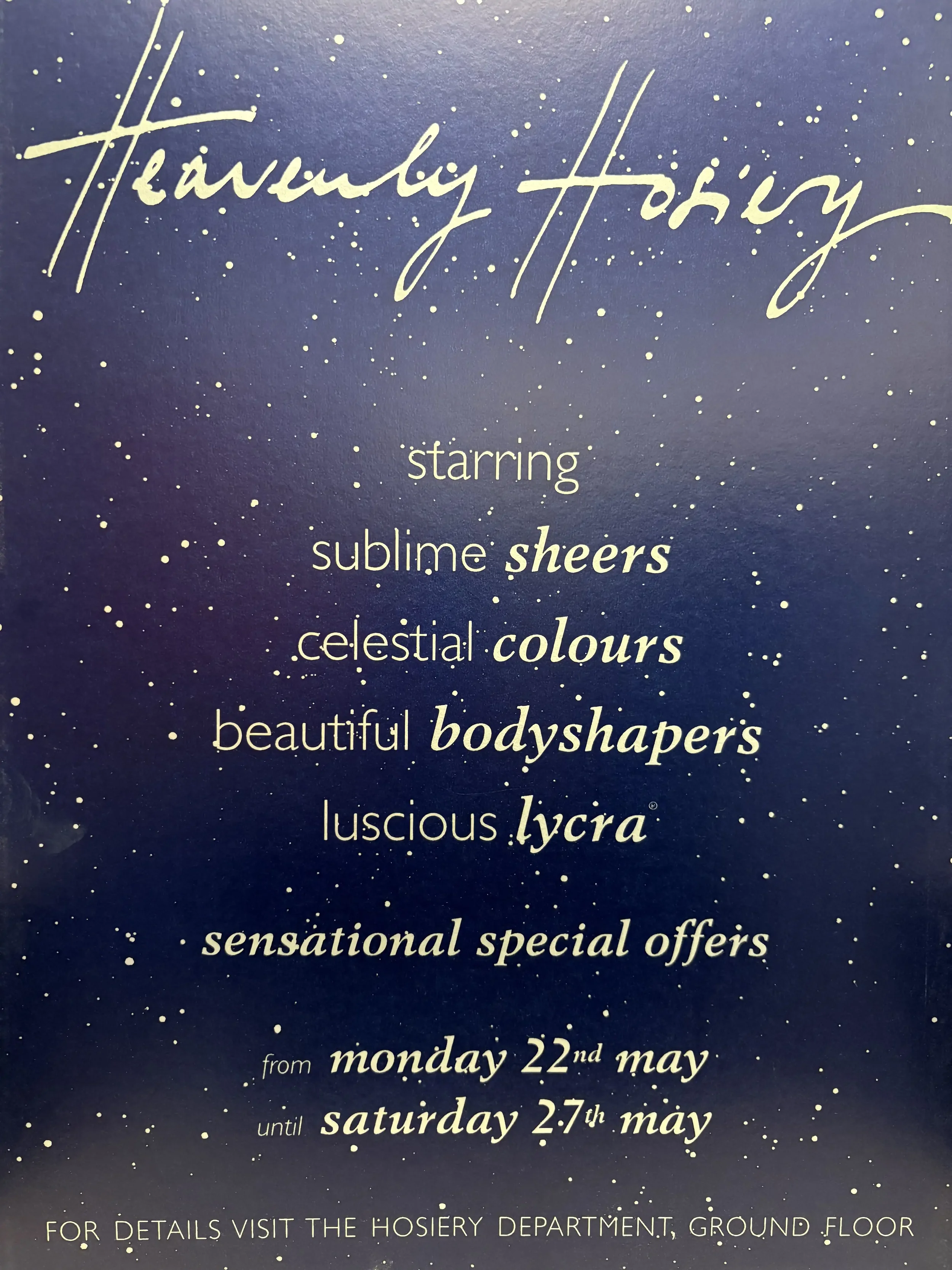 Heavenly Hosiery poster design for Selfridges with white script text on a dark blue background with white stars, advertising a special offers from May 22 to May 27, featuring colourful body shapers and Lycras.