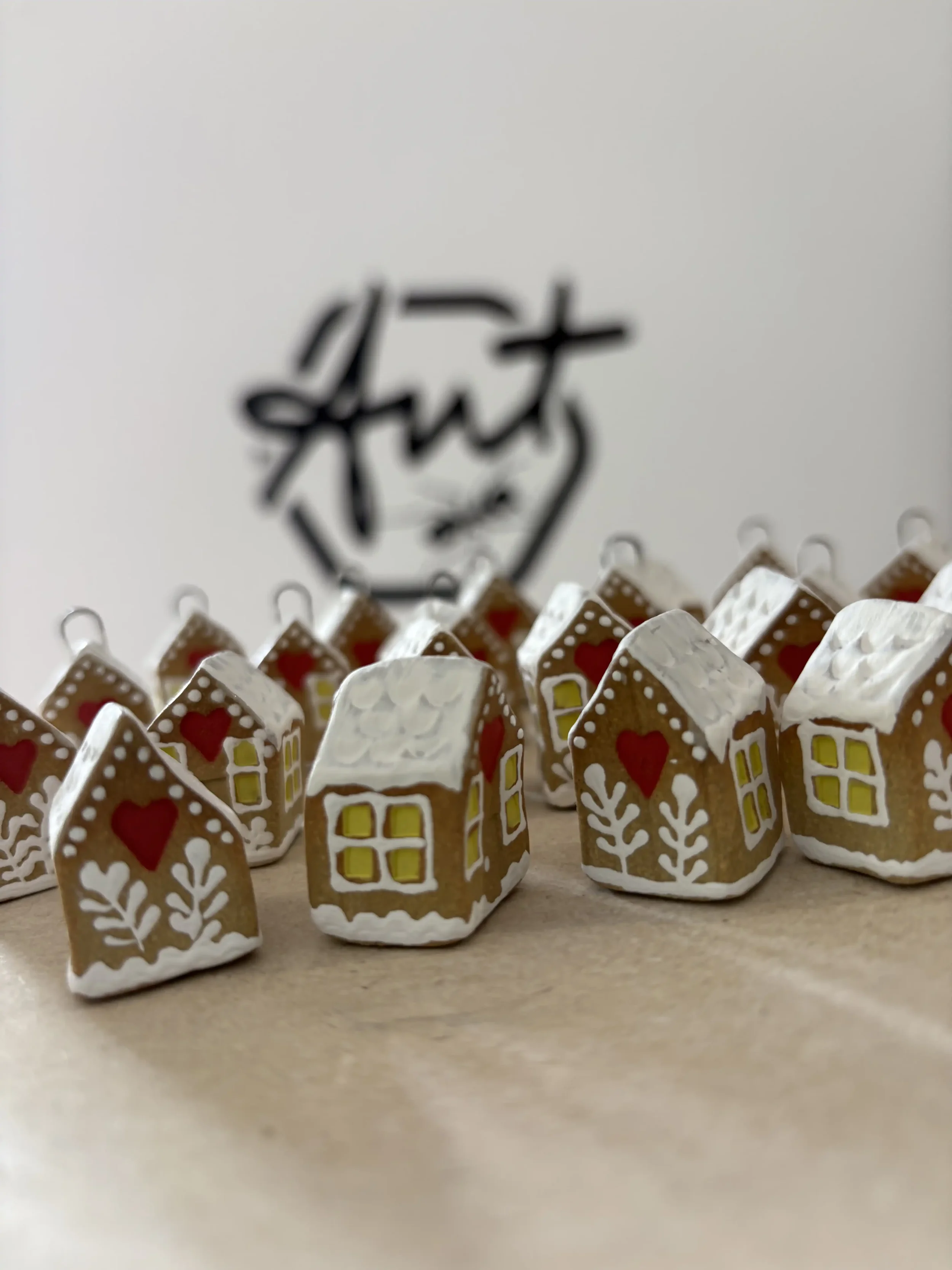Teeny hand decorated gingerbread houses.