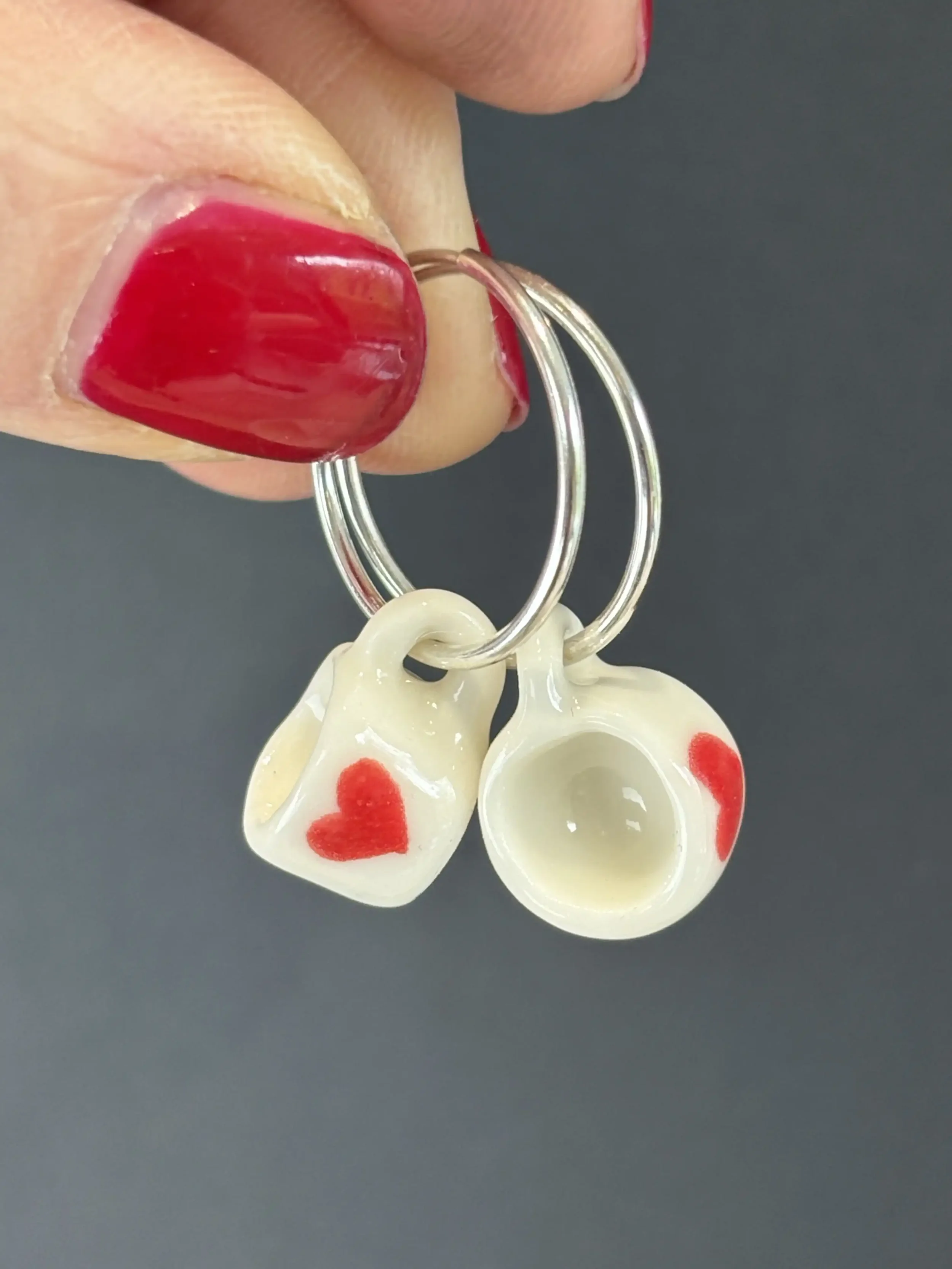 Porcelain heart cup endless hoop charms.