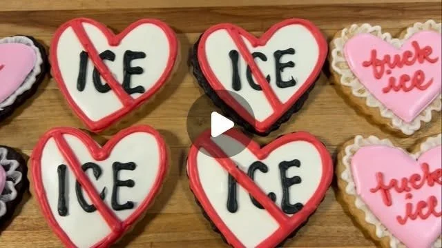 cookies with icing that says "fuck ice"