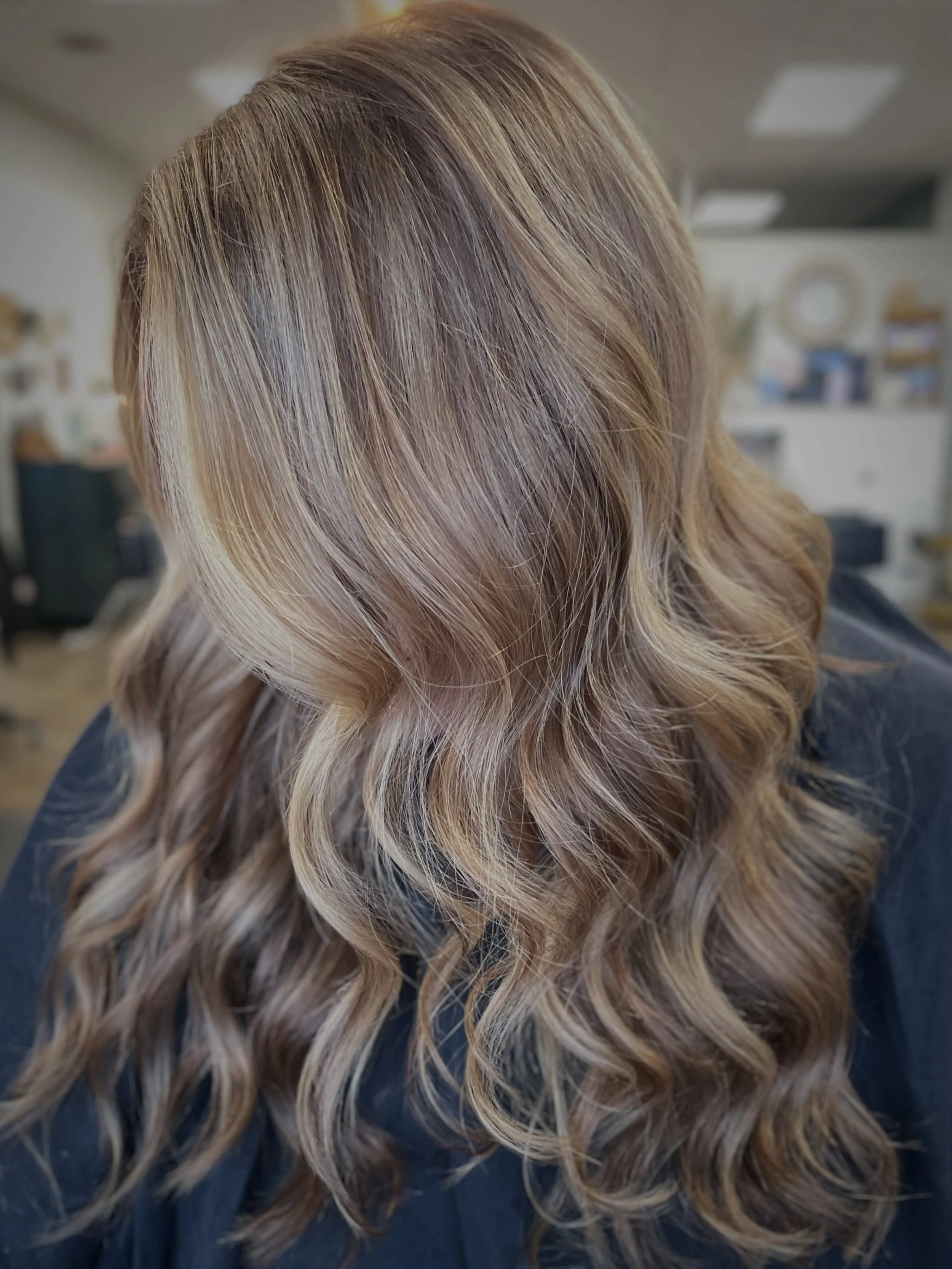 This is what consistency looks like. She&rsquo;s spent years in our chair exploring different color tones, placement and trends. She has trusted that we can transform her look while keeping the health and integrity of her hair the absolute number one