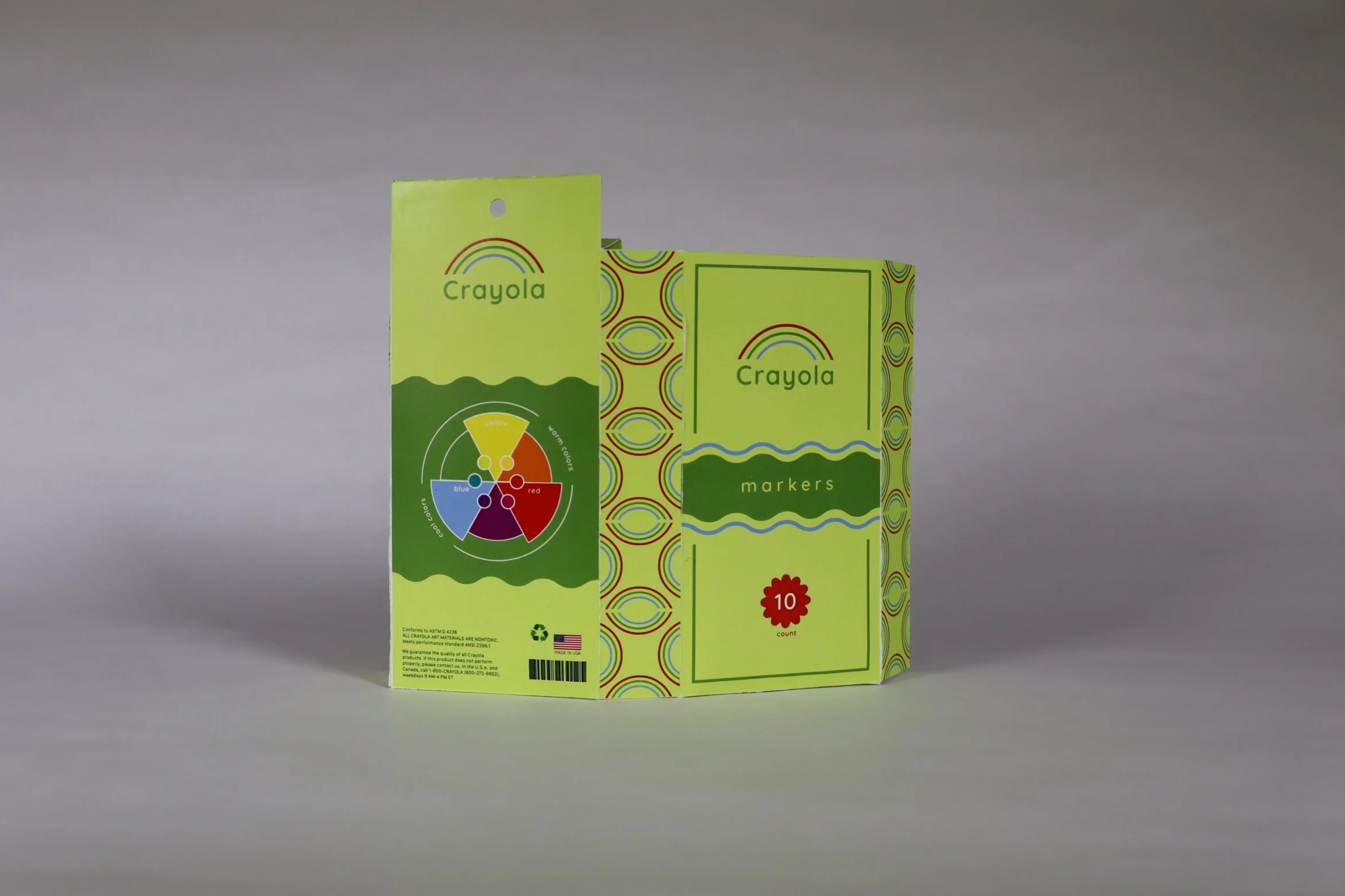 Closed Crayola marker box redesign with green background, circular patterns, and a red starburst reading 10.