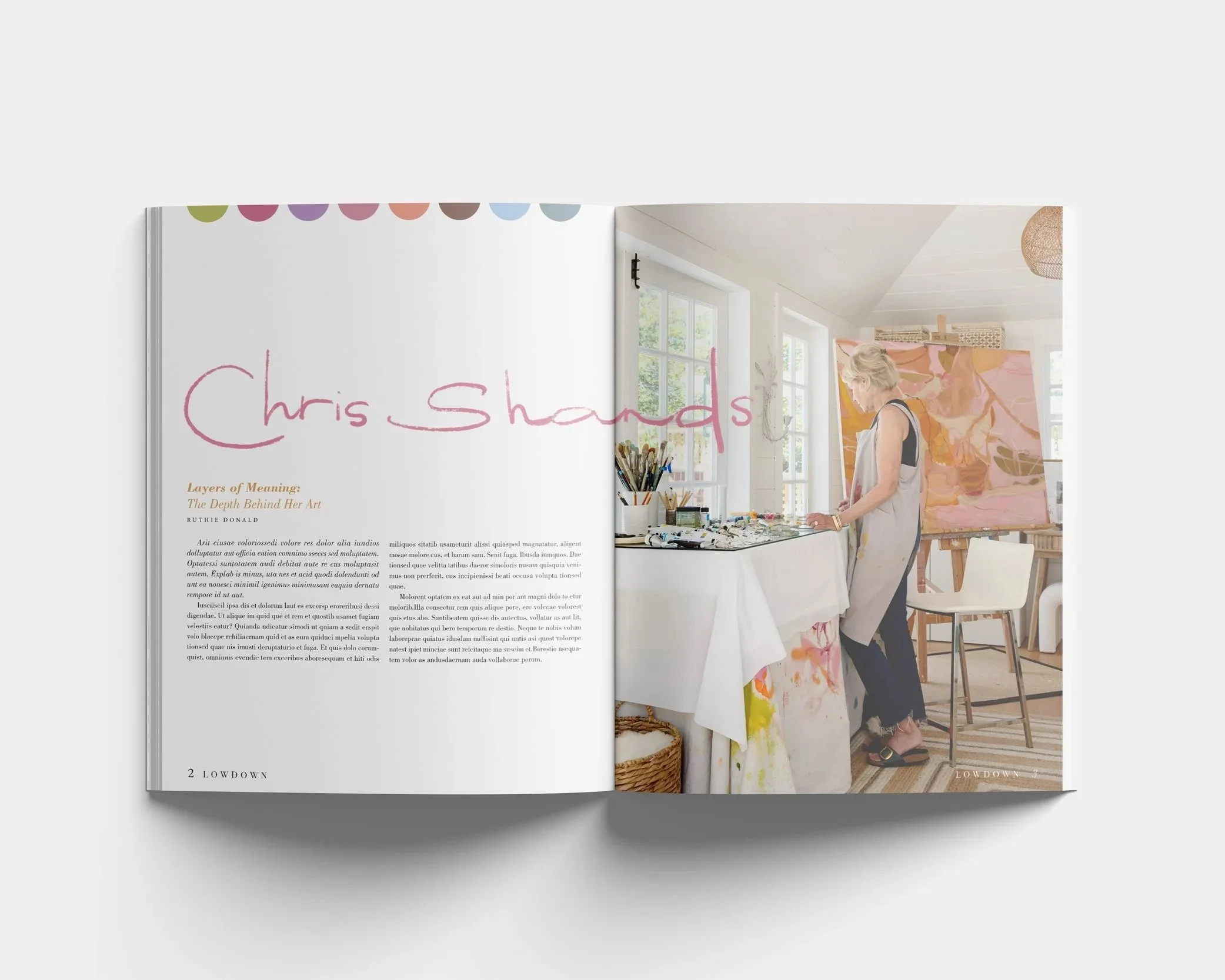 Magazine spread with large artistic typography spelling ‘Chris Shands’ alongside a photo of the artist working in her studio..