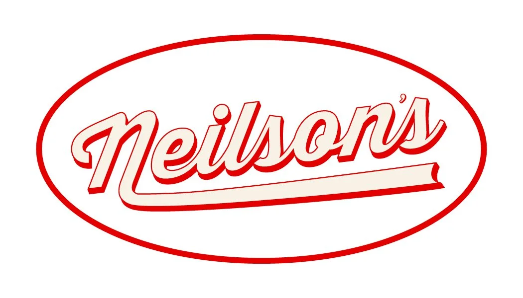Neilson’s primary logo in red script inside a red oval.