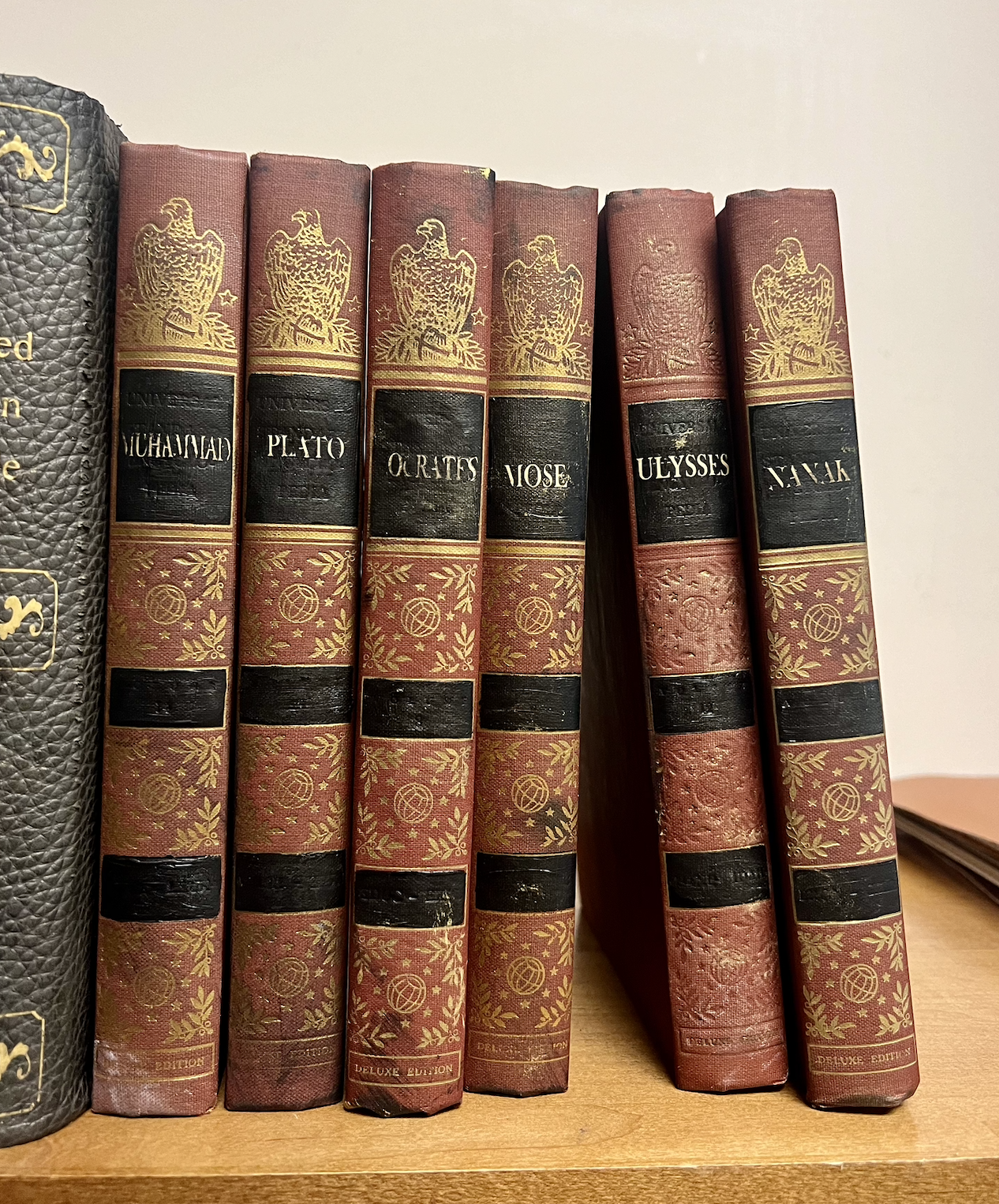 Painted, cut vinyl, and aged books for film.