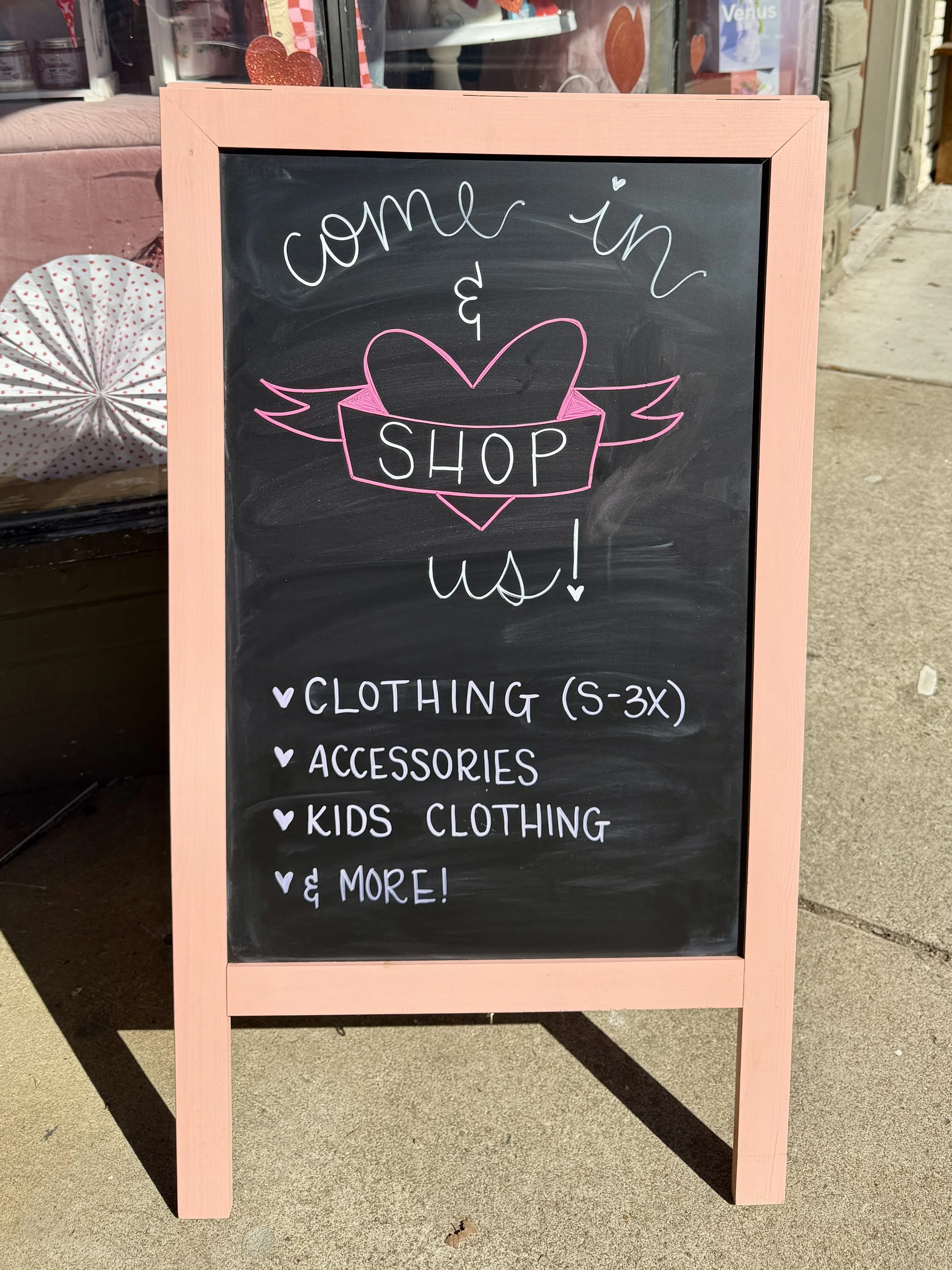 Chalkboard sign for boutique.