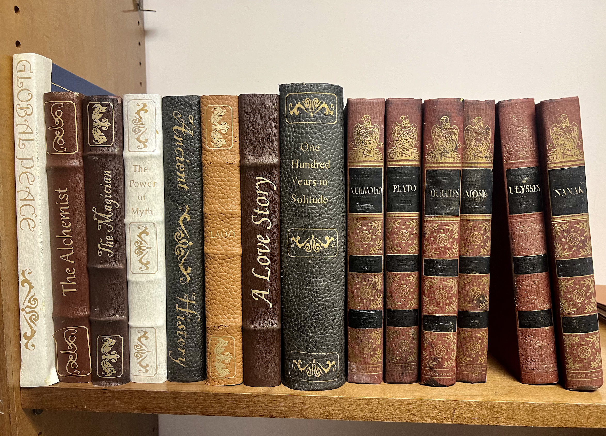 Set of books created for feature film (The Gardener). Fabricated, designed, and cut/placed vinyl on books.