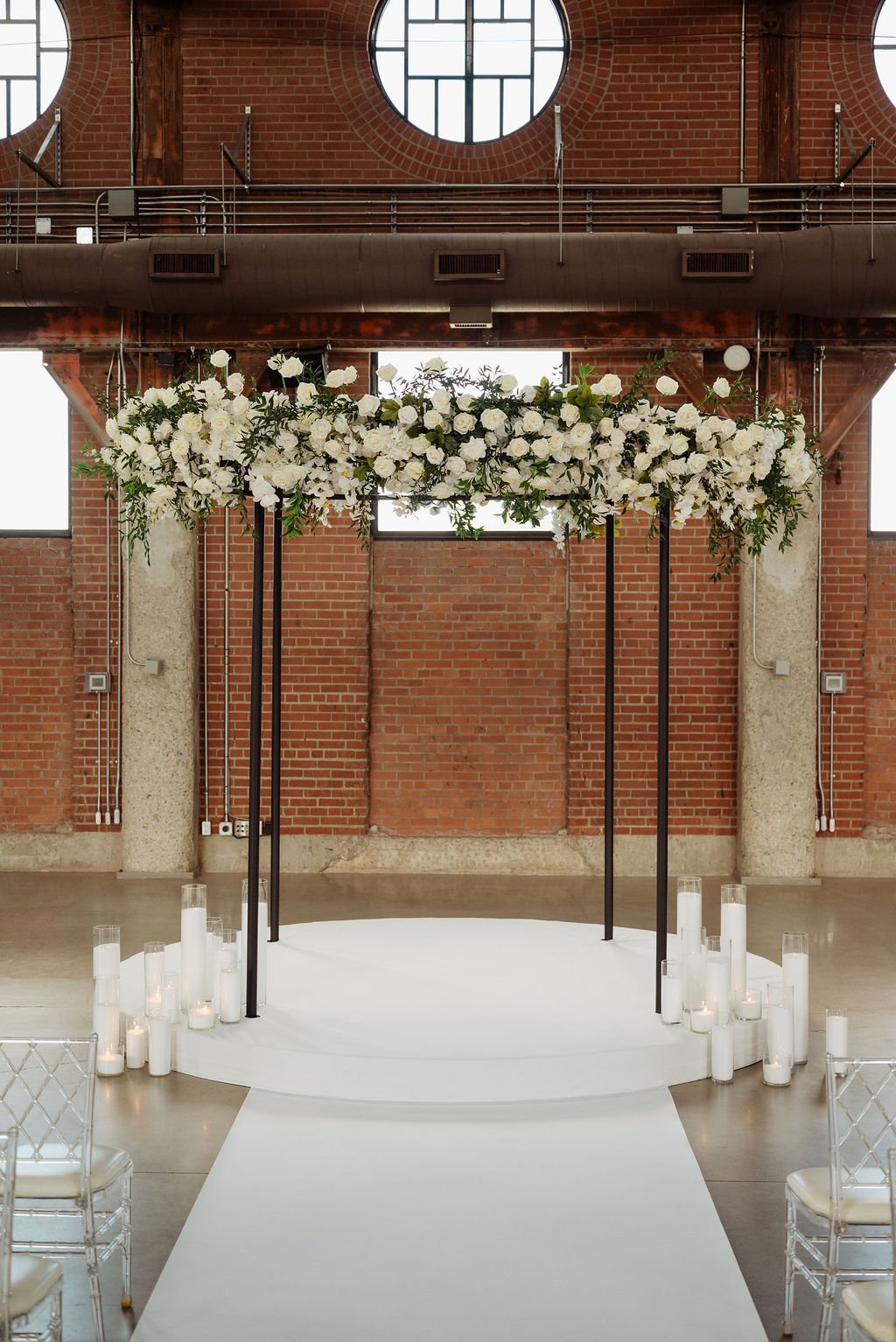 Orbit architectural ceremony structure with integrated stage at The Symes in Toronto.