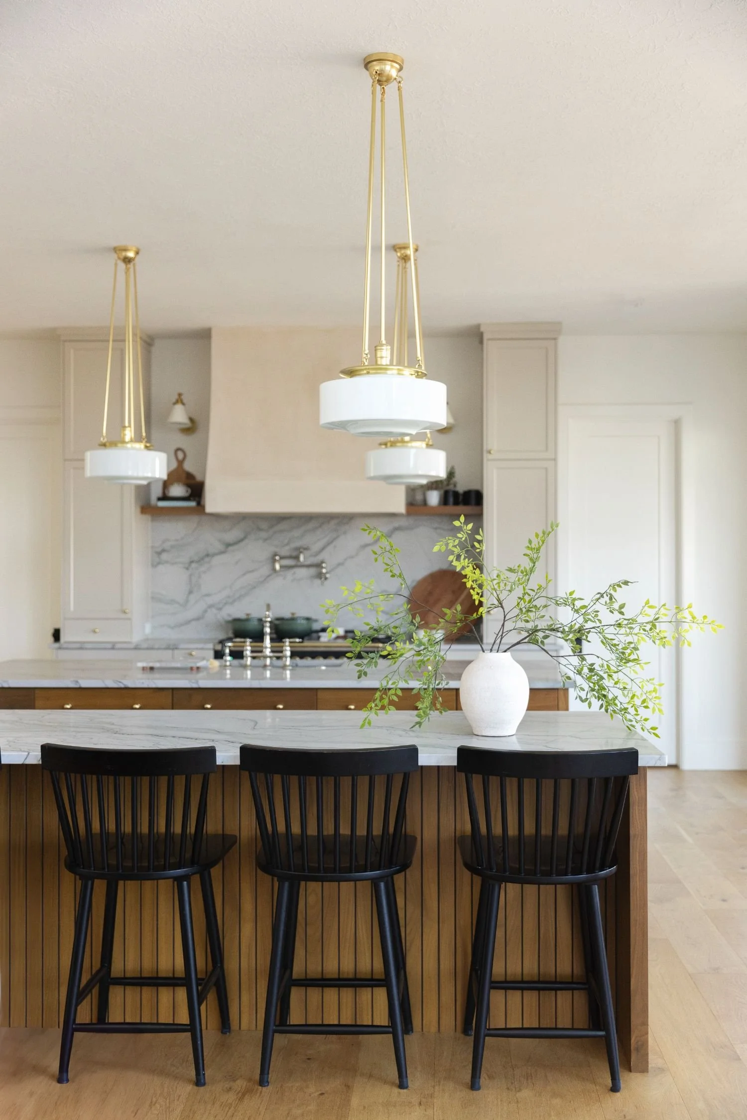 Newly built West Michigan kitchen with modern finishes representing new construction homes available through Klompmaker and Co.