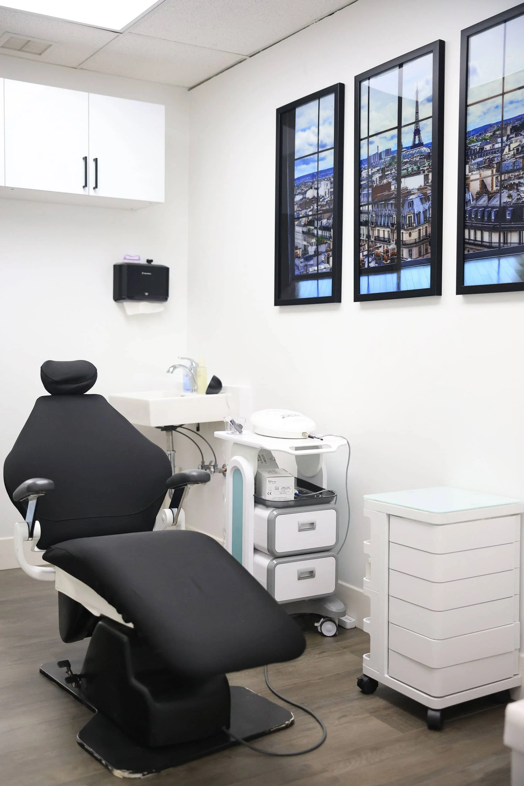 Modern aesthetics treatment room with reclined chair, ready for filler dissolver and filler correction appointments.