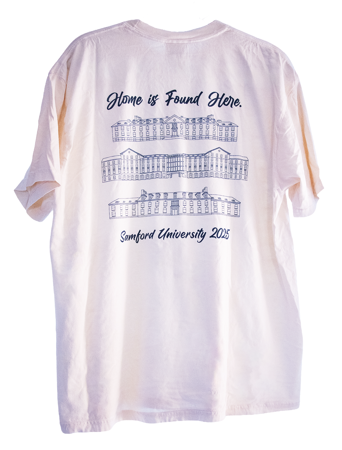 White T-shirt with a graphic of three buildings and text that says "Home is Found Here. + Samford University 2025".