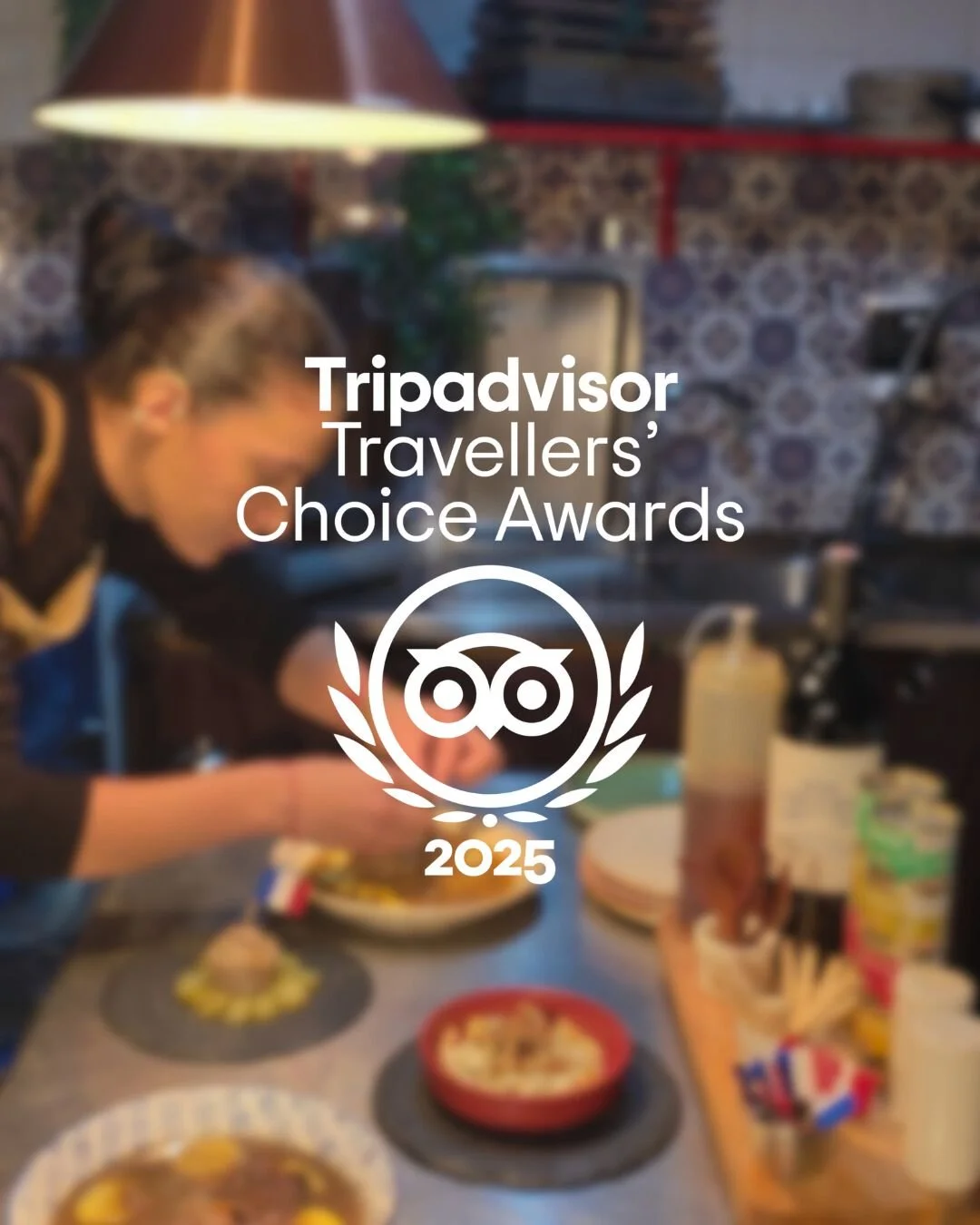 The image shows a person preparing food in a kitchen with various dishes, bottles, and kitchen items on the counter.