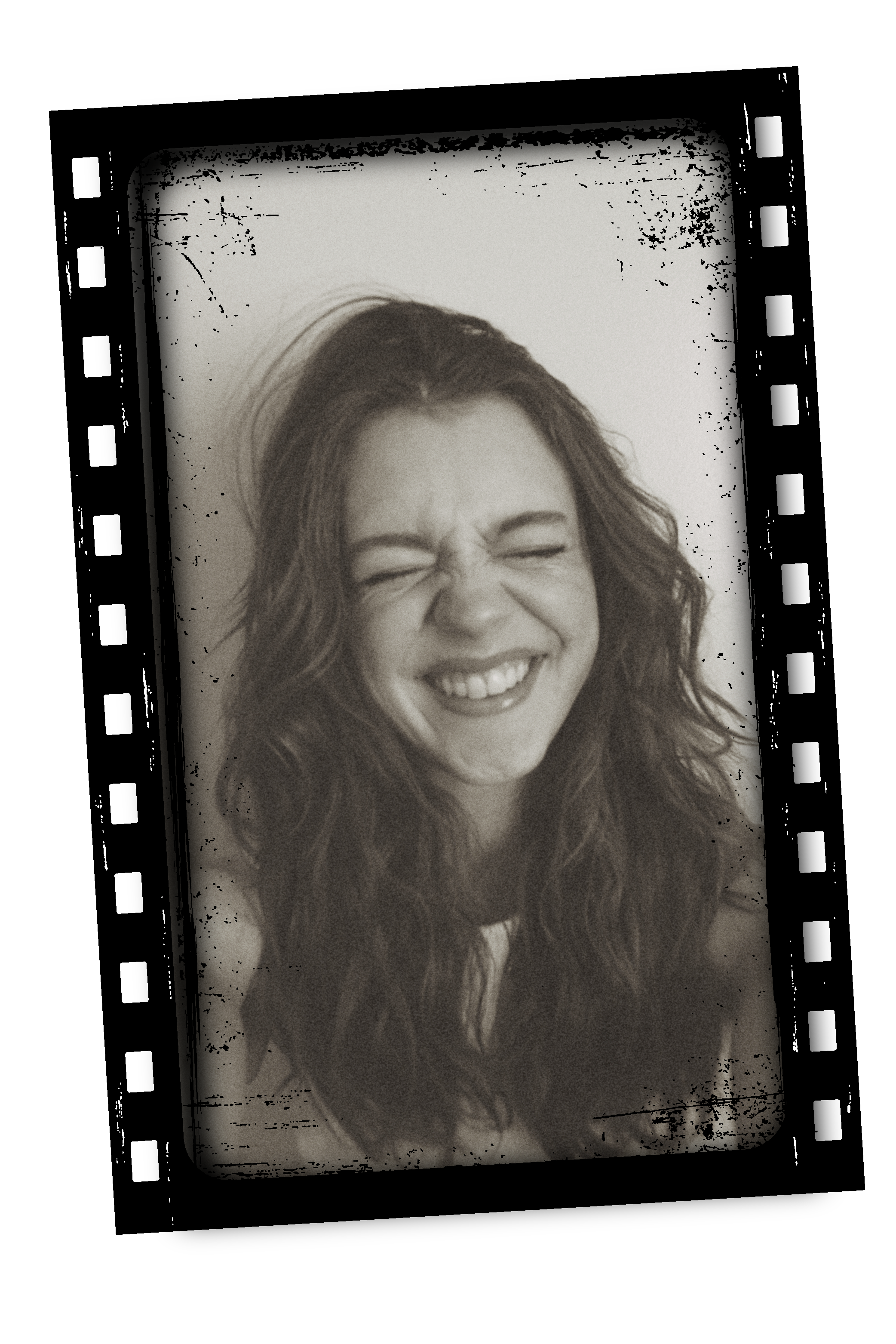 Black and white photo of a woman smiling with eyes closed, long wavy hair, on a smartphone screen.