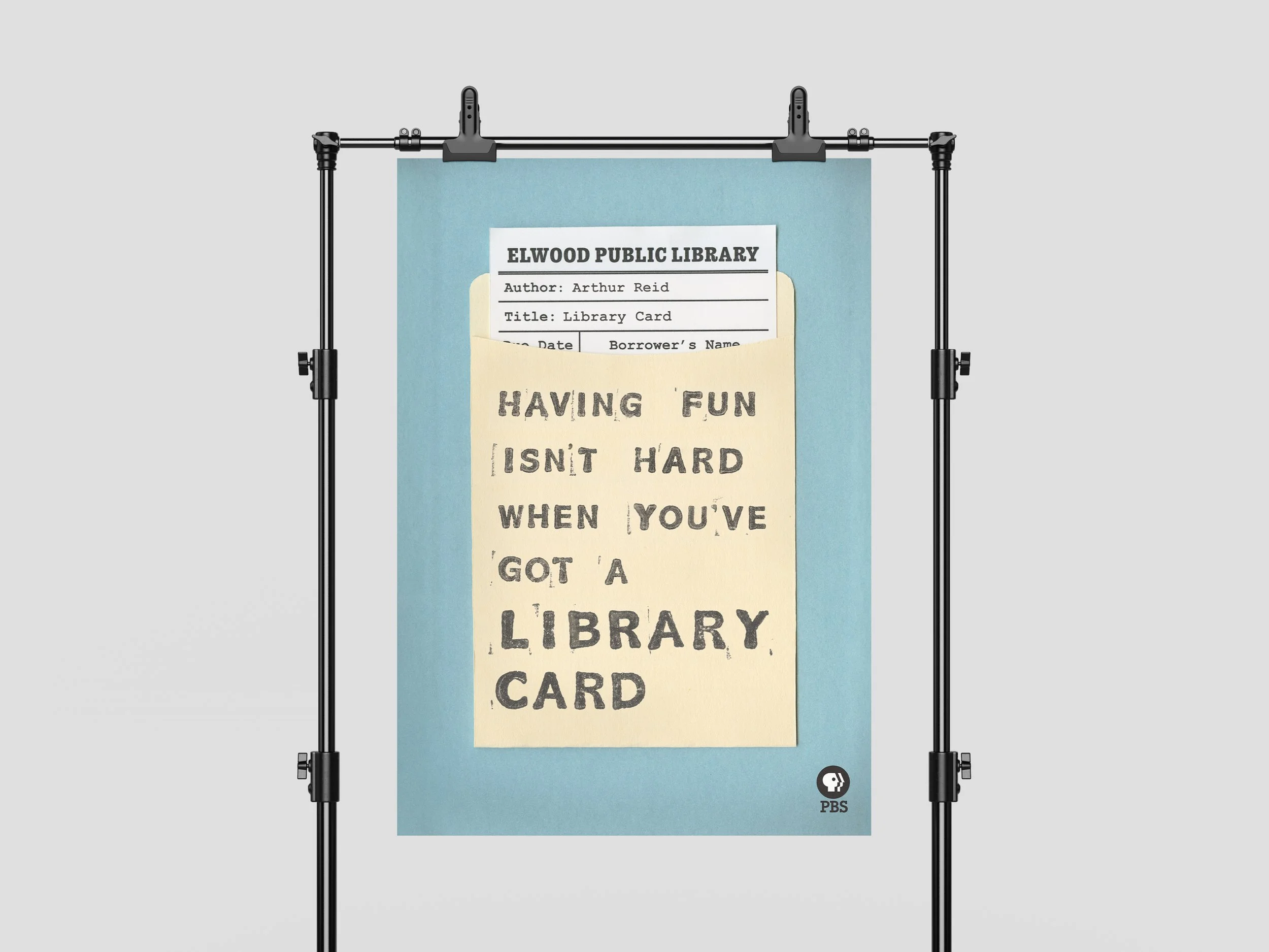 A poster with a library card and a quote: "Having fun isn't hard when you've got a library card," displayed on a blue background, with a PBS logo at the bottom right.