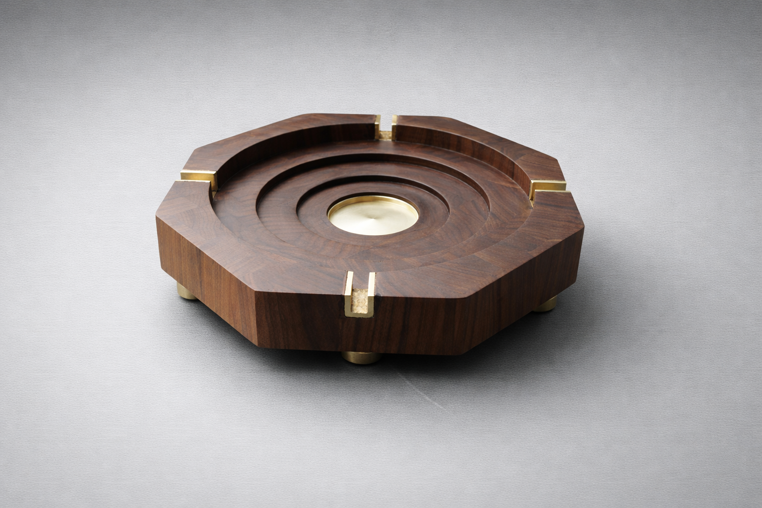 Elegant walnut and brass ashtray.png