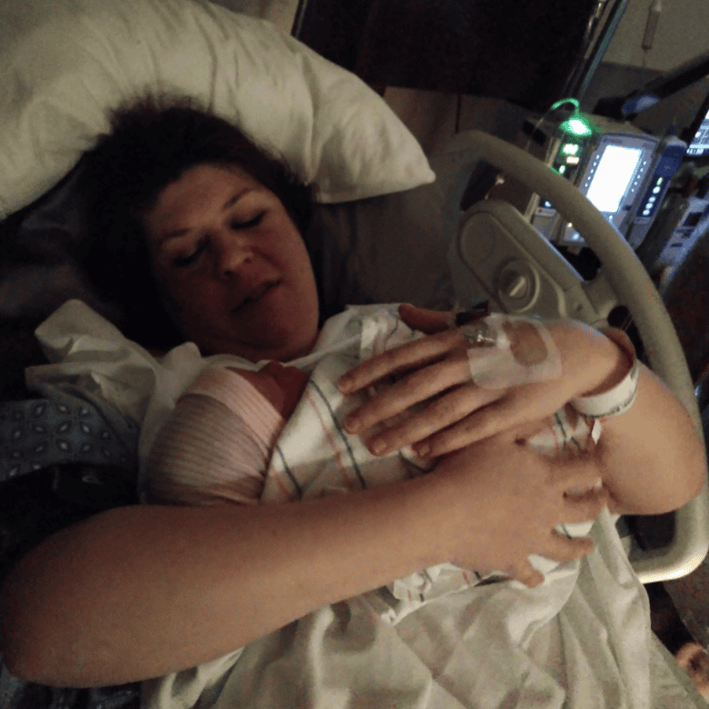birth story image just after birth mother holding infant